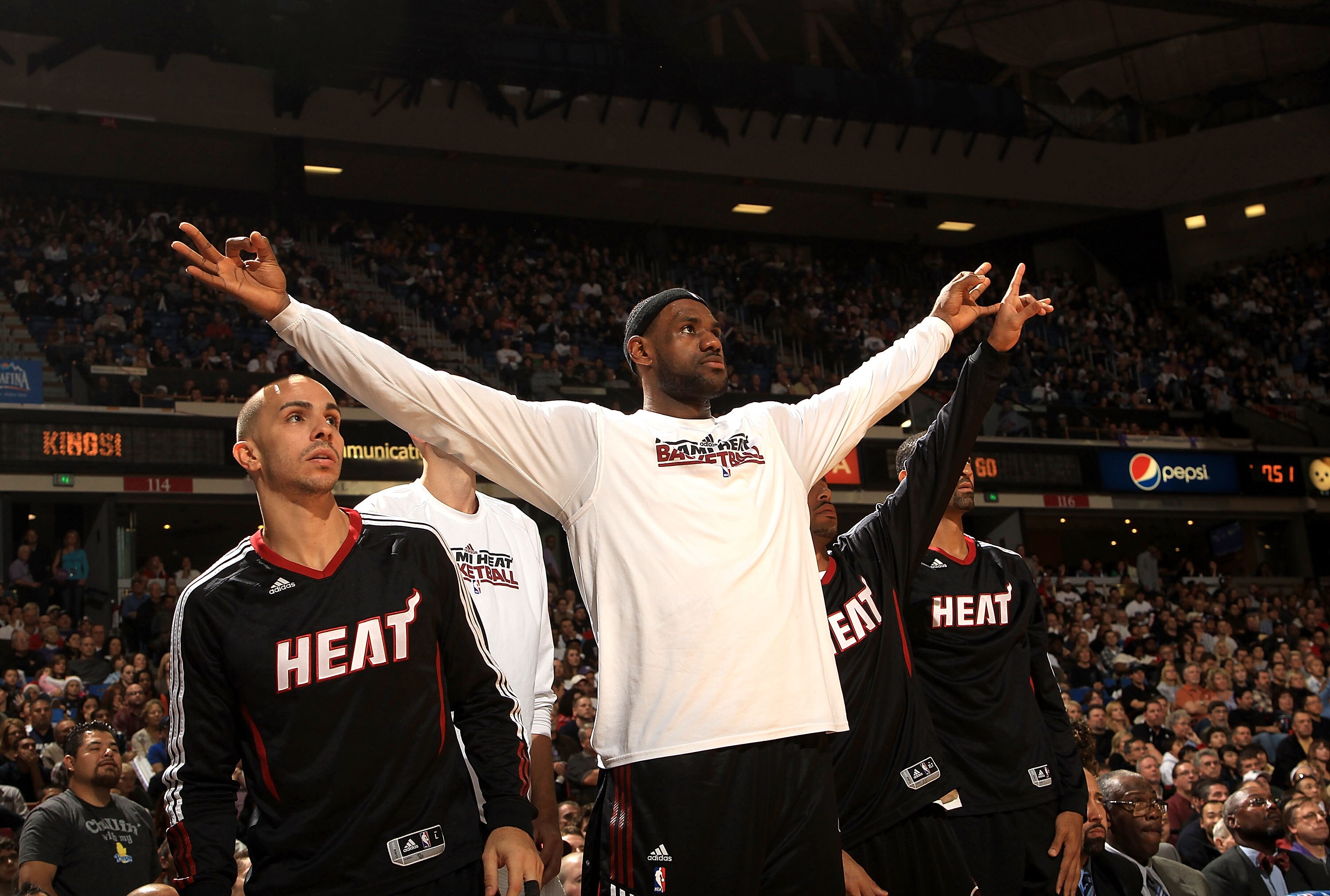 SACRAMENTO, CA - DECEMBER 11:  Lebron James #6 of the Miami Heat cheers his team on from the bench during their game against the Sacramento Kings at ARCO Arena on December 11, 2010 in Sacramento, California.  NOTE TO USER: User expressly acknowledges and 