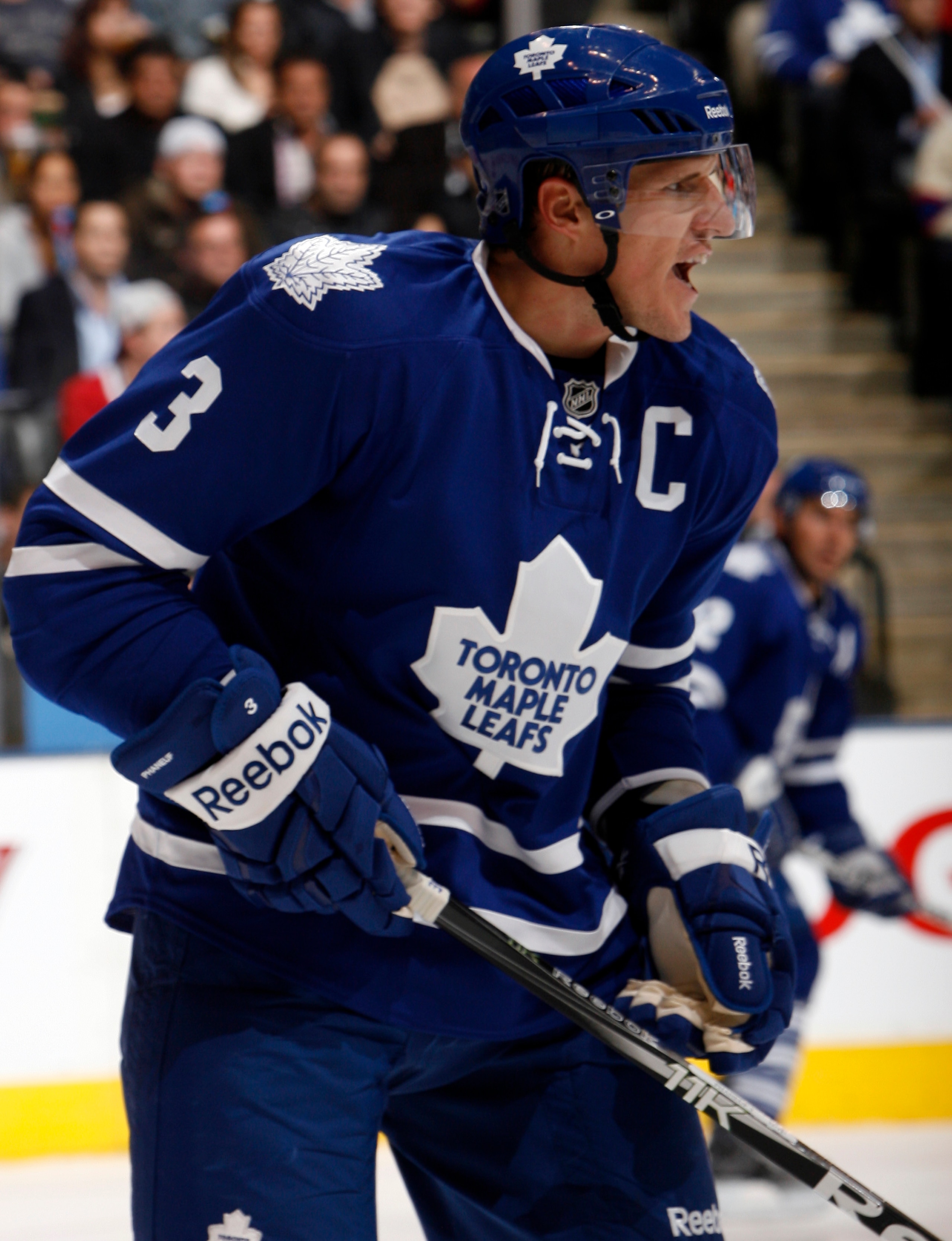 TORONTO, CANADA - OCTOBER 07: Dion Phaneuf #3 of the Toronto Maple Leafs calls for a pass during a regular season NHL game against the Montreal Canadiens at the Air Canada Centre October 7, 2010 in Toronto, Ontario, Canada. (Photo by Abelimages/Getty Imag