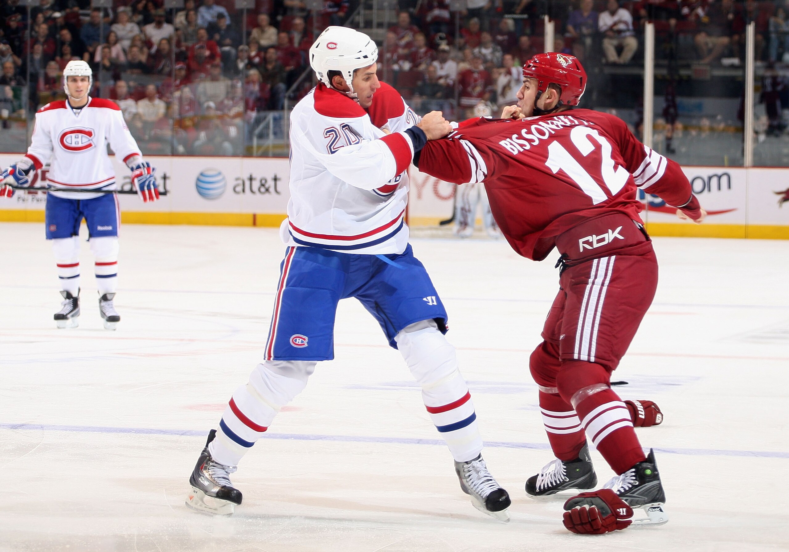 GLENDALE, AZ - NOVEMBER 12:  Paul Bissonnette #12 of the Phoenix Coyotes fights with Jay Leach #20 of the Montreal Canadiens during the NHL game at Jobing.com Arena on November 12, 2009 in Glendale, Arizona. The Canadiens defeated the Coyotes 4-2. (Photo