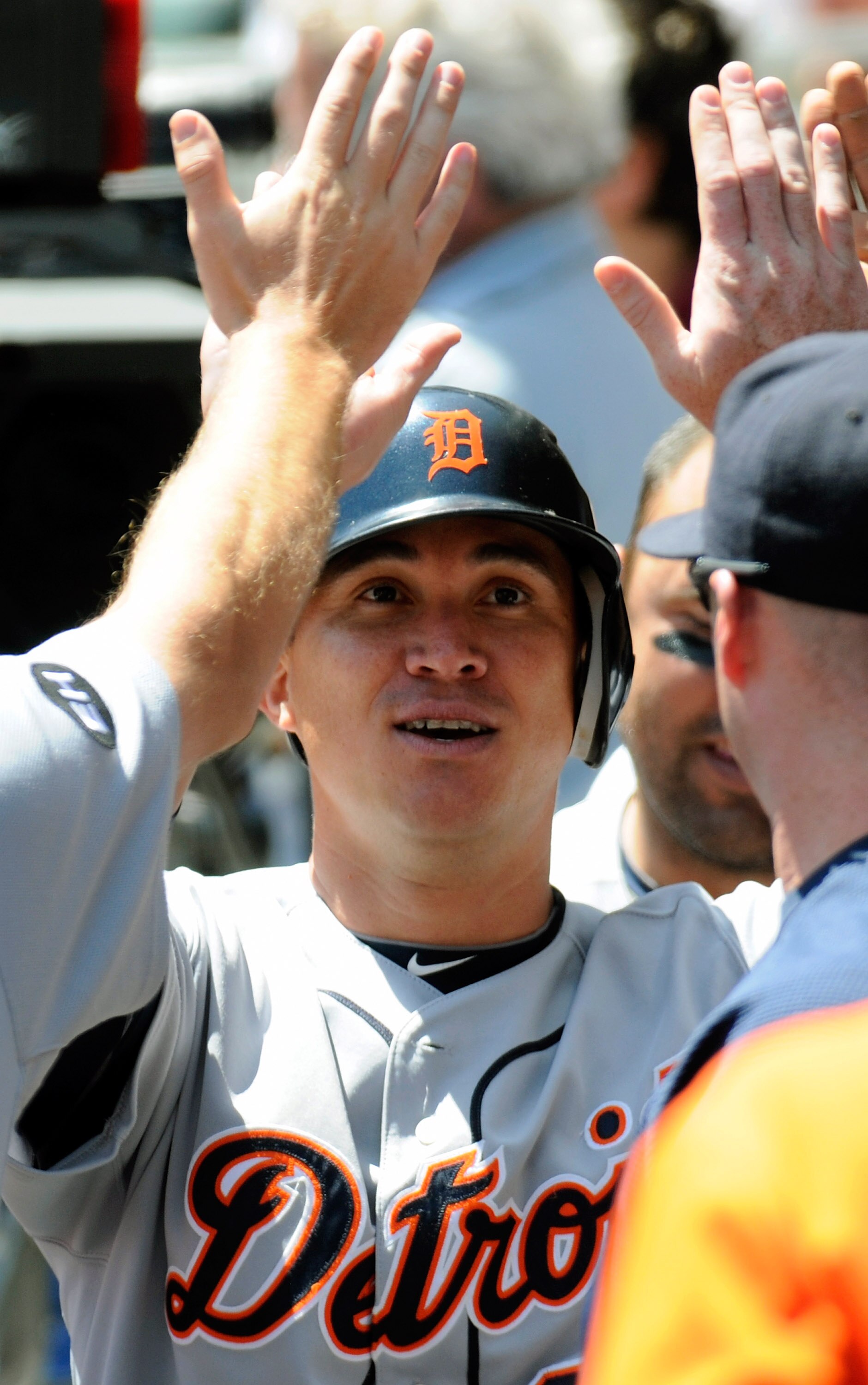MINNEAPOLIS, MN - JUNE 30: Magglio Ordonez #30 of the Detroit Tigers celebrates scoring with his teammates in the fourth inning against the Minnesota Twins during their game on June 30, 2010 at Target Field in Minneapolis, Minnesota. (Photo by Hannah Fosl