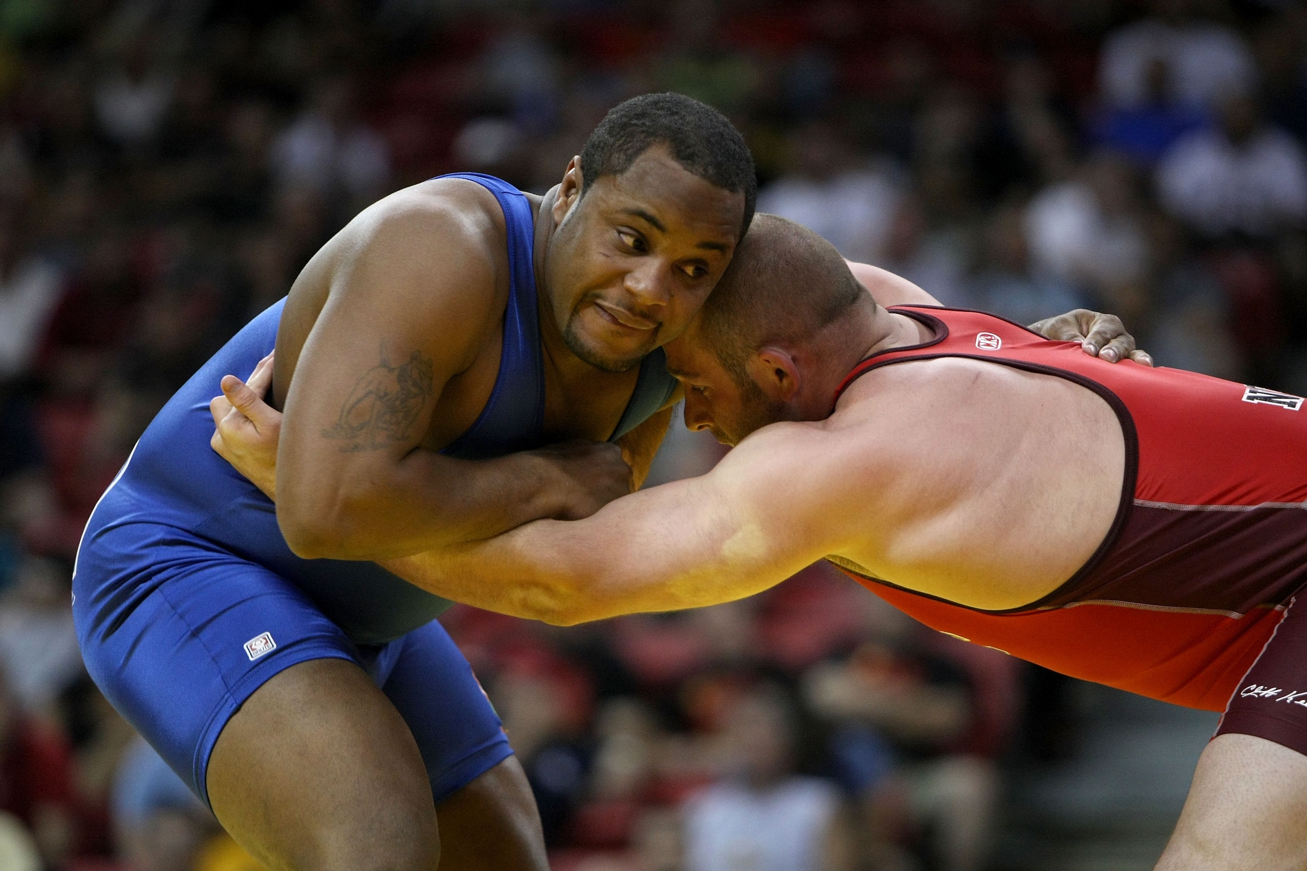 LAS VEGAS - JUNE 15:  Daniel Cormier (blue) wrestles Damion Hahn (red) in the Freestyle 96kg division championship match during the USA Olympic trials for wrestling and judo on June 15, 2008 at the Thomas & Mack Center in Las Vegas, Neveda.  (Photo by Jon