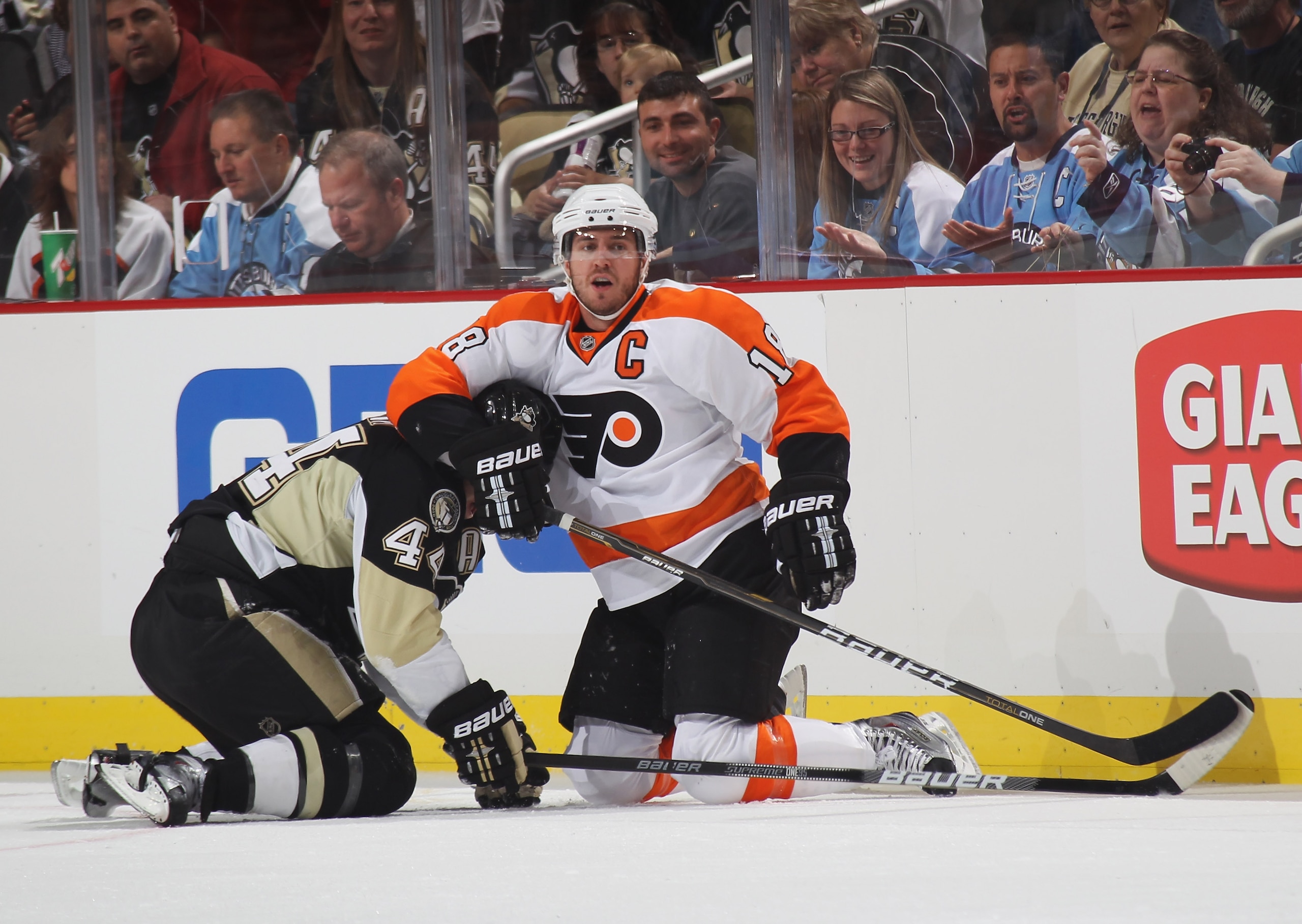 PITTSBURGH - OCTOBER 07: Mike Richards #18 of the Philadelphia Flyers skates against Brooks Orpik #44 of the Pittsburgh Penguins at the Consol Energy Center on October 7, 2010 in Pittsburgh, Pennsylvania.  (Photo by Bruce Bennett/Getty Images)