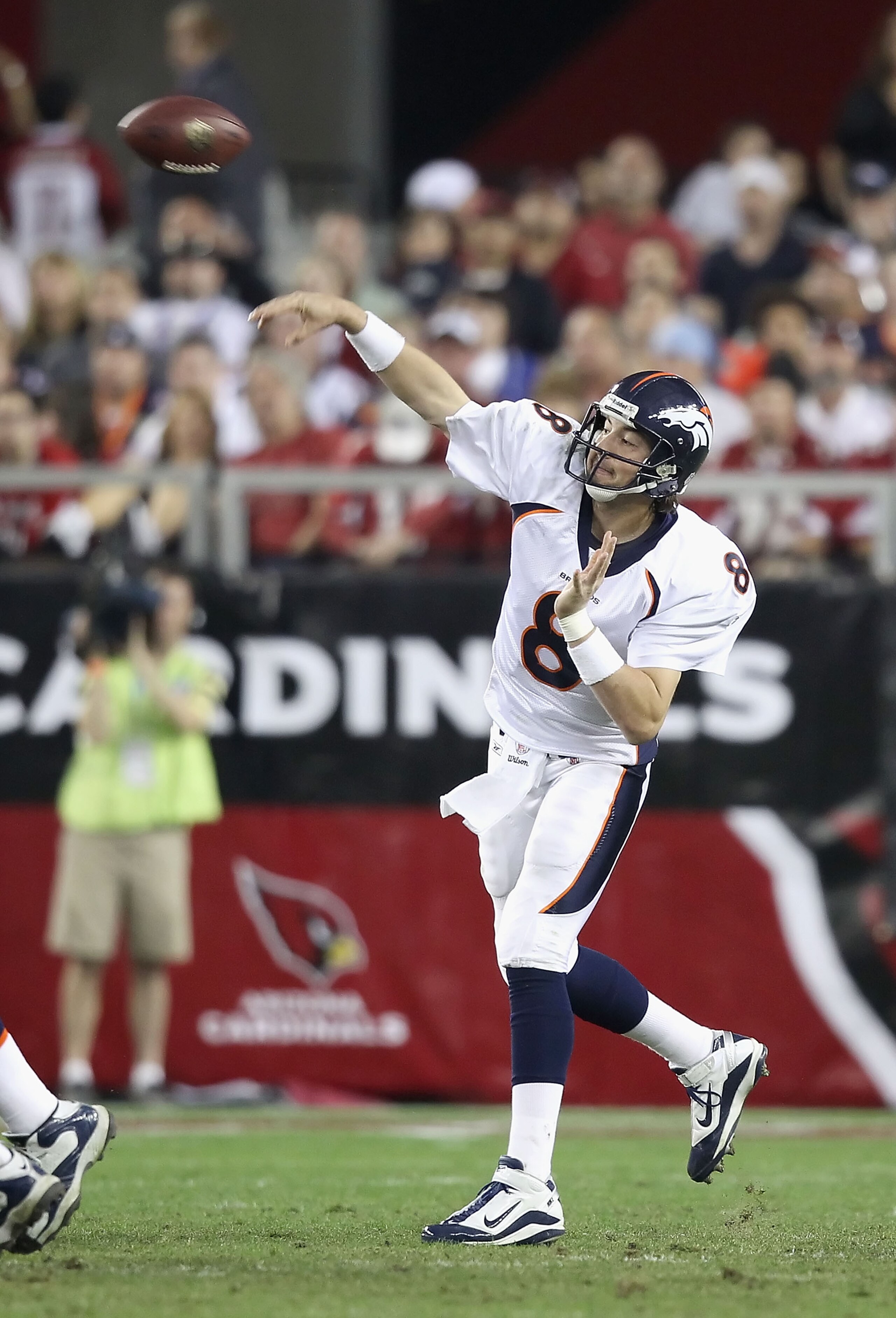GLENDALE, AZ - DECEMBER 12:  Quarterback Kyle Orton #8 of the Denver Broncos throws a pass during the NFL game against the Arizona Cardinals at the University of Phoenix Stadium on December 12, 2010 in Glendale, Arizona.  The Cardinals defeated the Bronco