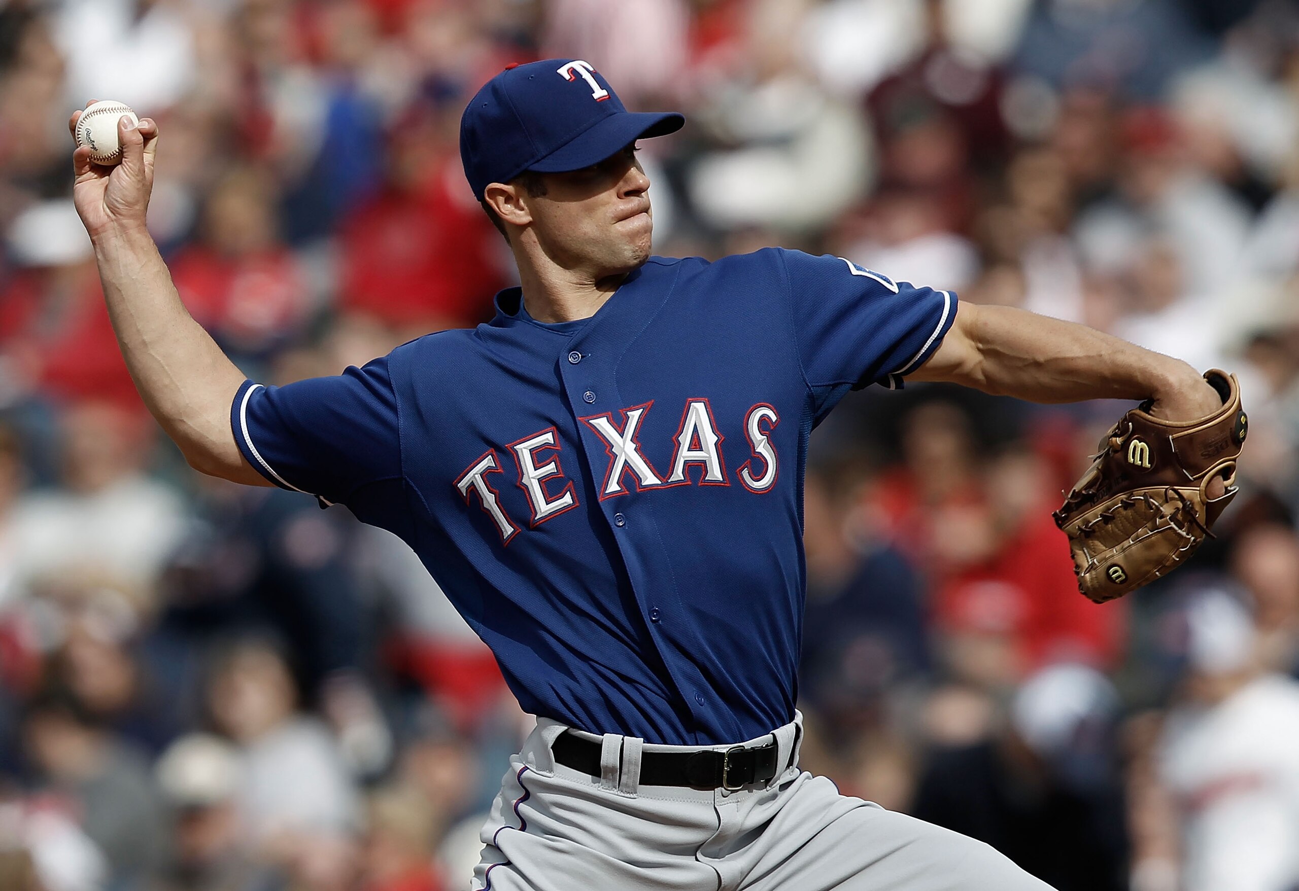 CLEVELAND, OH- APRIL 12: Rich Harden #40 of the Texas Rangers pitches against the Cleveland Indians during the Opening Day game on April 12, 2010 at Progressive Field in Cleveland, Ohio.  (Photo by Jared Wickerham/Getty Images)