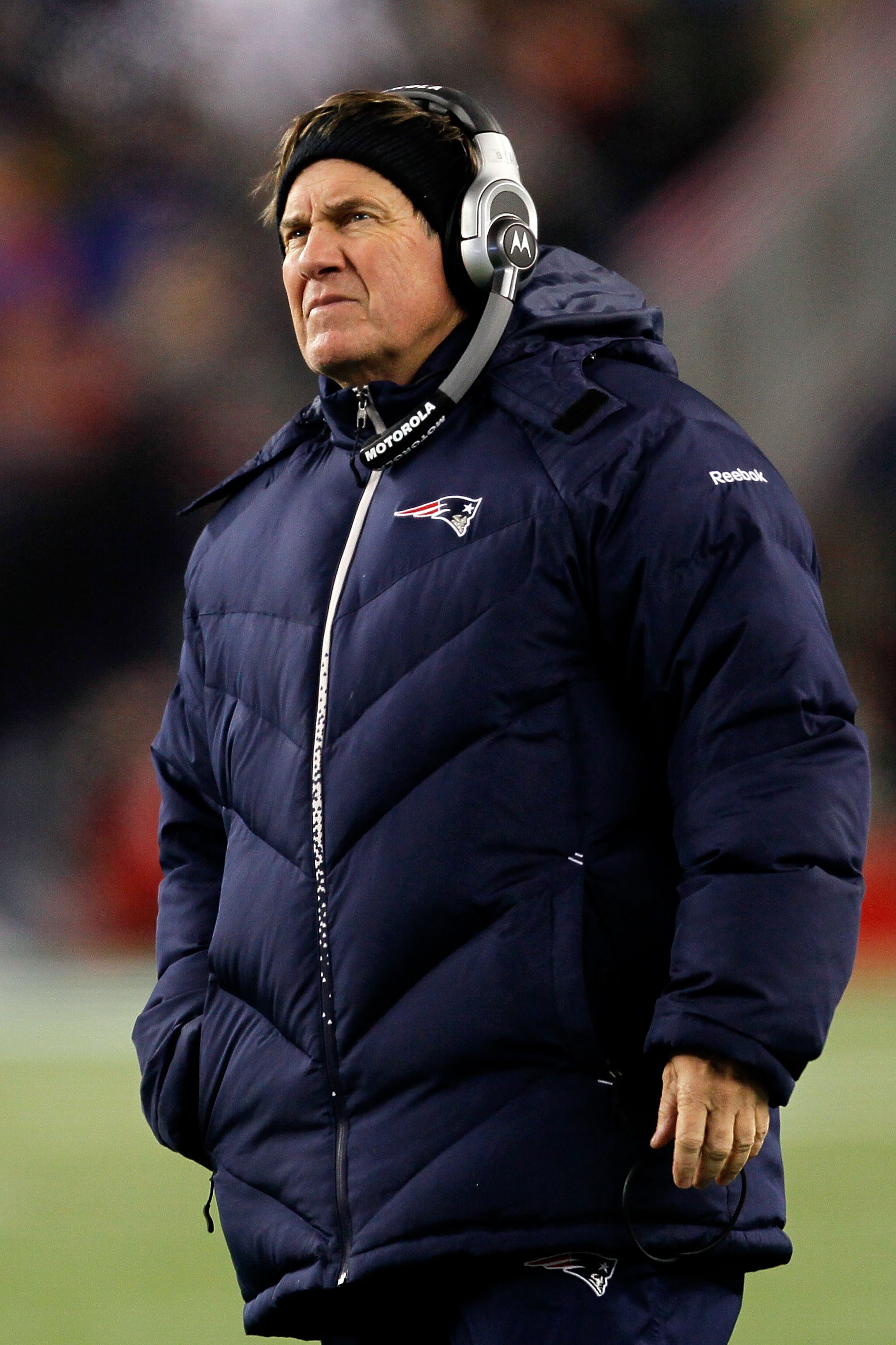 FOXBORO, MA - DECEMBER 06: Head coach Bill Belichick of the New England Patriots looks on in the first half against the New York Jets at Gillette Stadium on December 6, 2010 in Foxboro, Massachusetts. (Photo by Jim Rogash/Getty Images) FOXBORO, MA - DECEMBER 06: Head coach Bill Belichick of the New England Patriots looks on in the first half against the New York Jets at Gillette Stadium on December 6, 2010 in Foxboro, Massachusetts. (Photo by Jim Rogash/Getty Images)