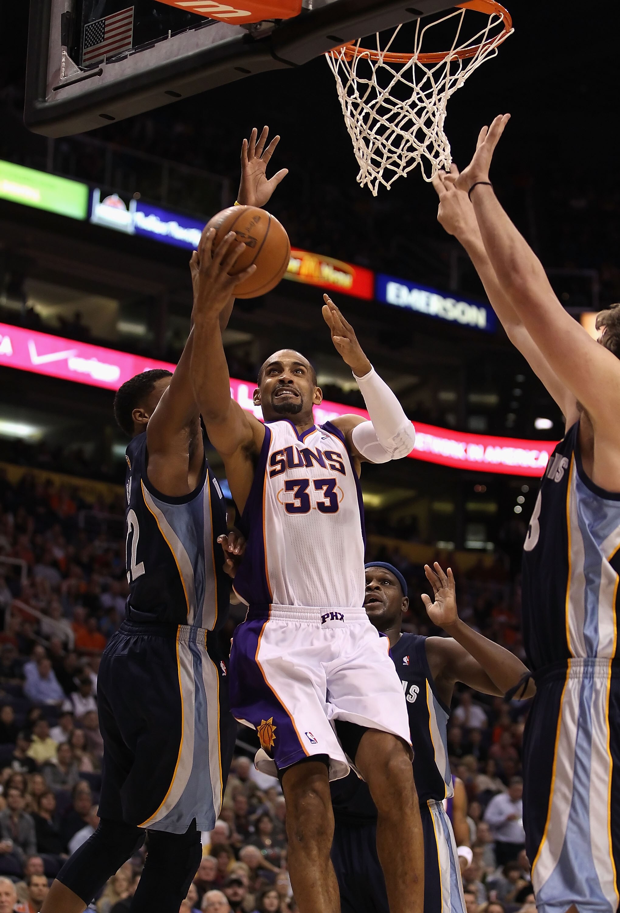 PHOENIX - DECEMBER 08:  Grant Hill #33 of the Phoenix Suns lays up a shot during the NBA game against the Memphis Grizzlies at US Airways Center on December 8, 2010 in Phoenix, Arizona. NOTE TO USER: User expressly acknowledges and agrees that, by downloa