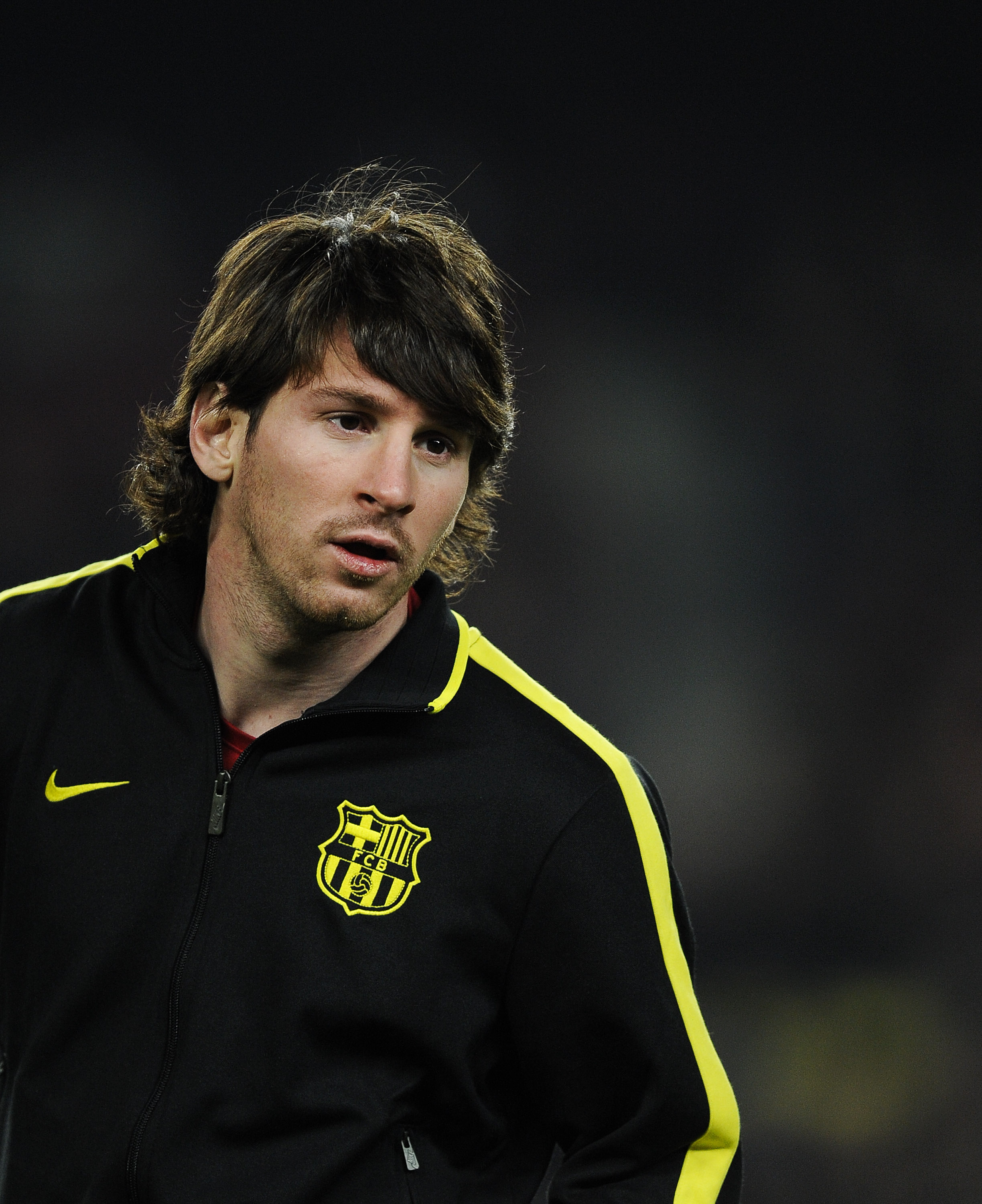 BARCELONA, SPAIN - DECEMBER 12:  Lionel Messi of Barcelona looks on during the warm up prior the La Liga match between Barcelona and Real Sociedad at Camp Nou Stadium on December 12, 2010 in Barcelona, Spain. Barcelona won the match 5-0.  (Photo by David 