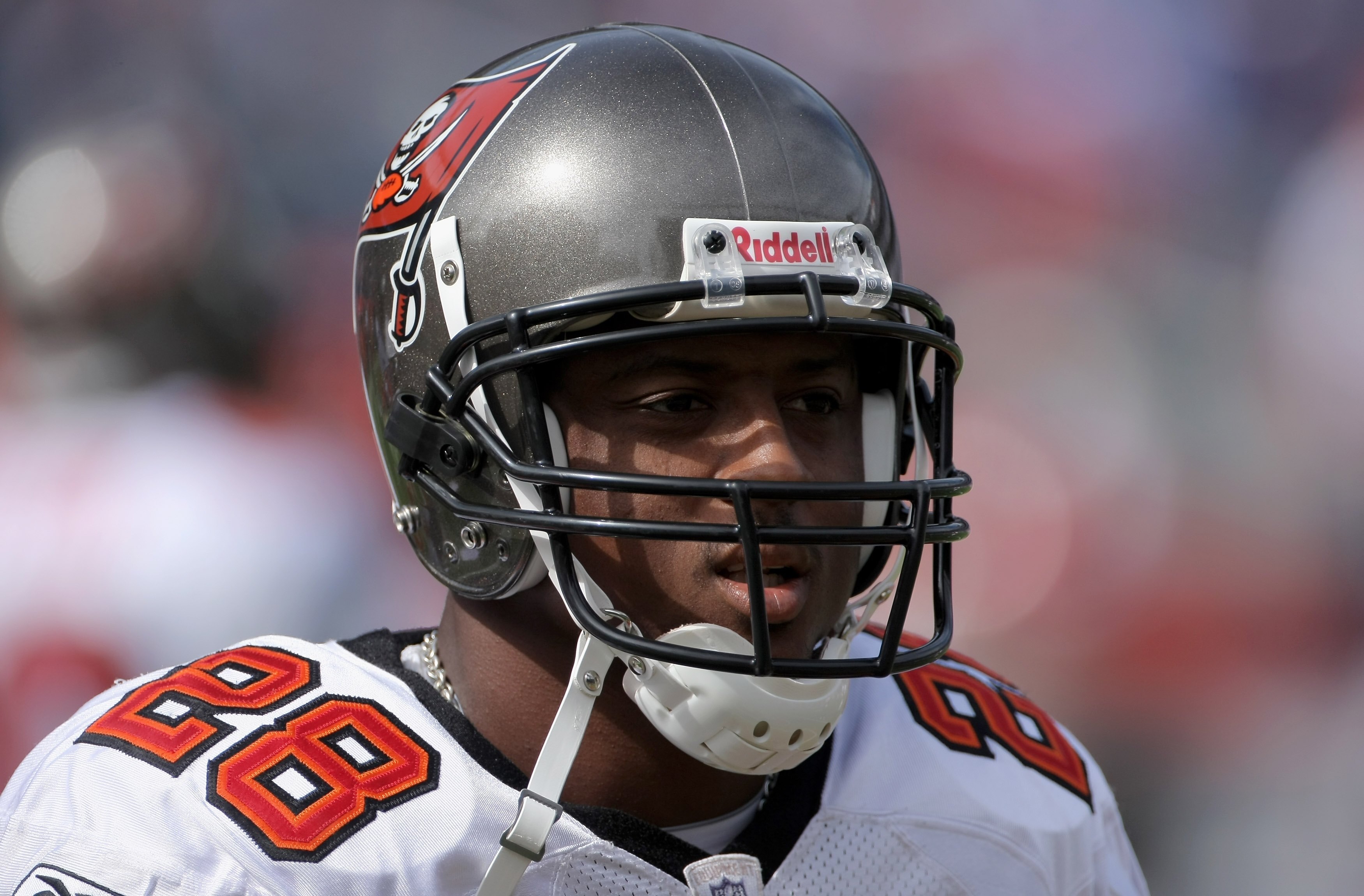 DENVER - OCTOBER 05:  Running back Warrick Dunn #28 of the Tampa Bay Buccaneers warms up prior to facing  the Denver Broncos during NFL action on October 5, 2008 in Denver, Colorado. The Broncos defeated the Buccaneers 16-13.  (Photo by Doug Pensinger/Get