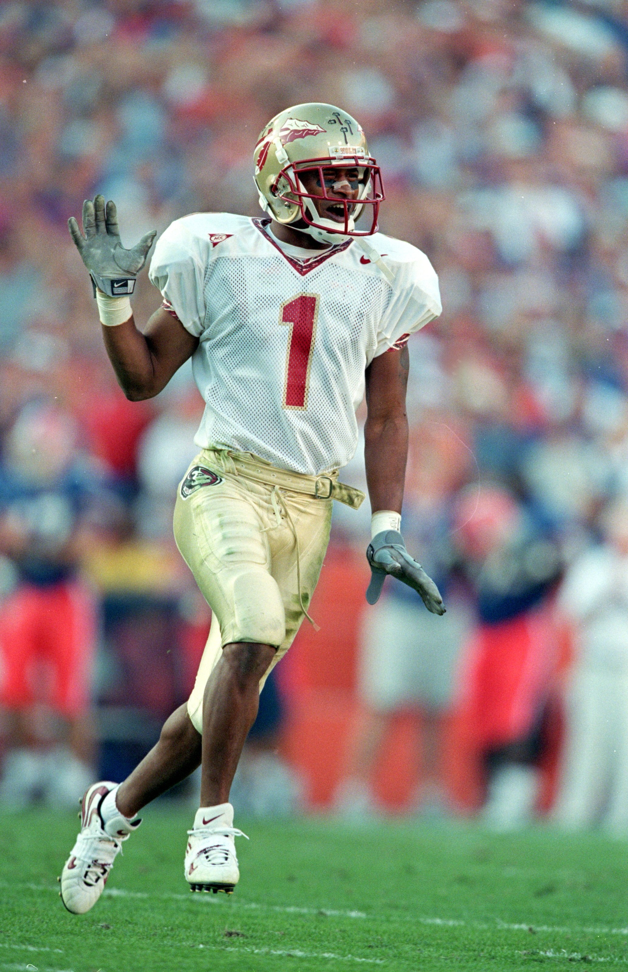 20 Nov 1999:  Reggie Durden #1 of the Florida State Seminoles celebrates on the field during the game against the Florida Gators at the Ben HillGriffin Stadium in Gainsville, Florida. The Seminoles defeated the Gators 23-30. Mandatory Credit: Andy Lyons