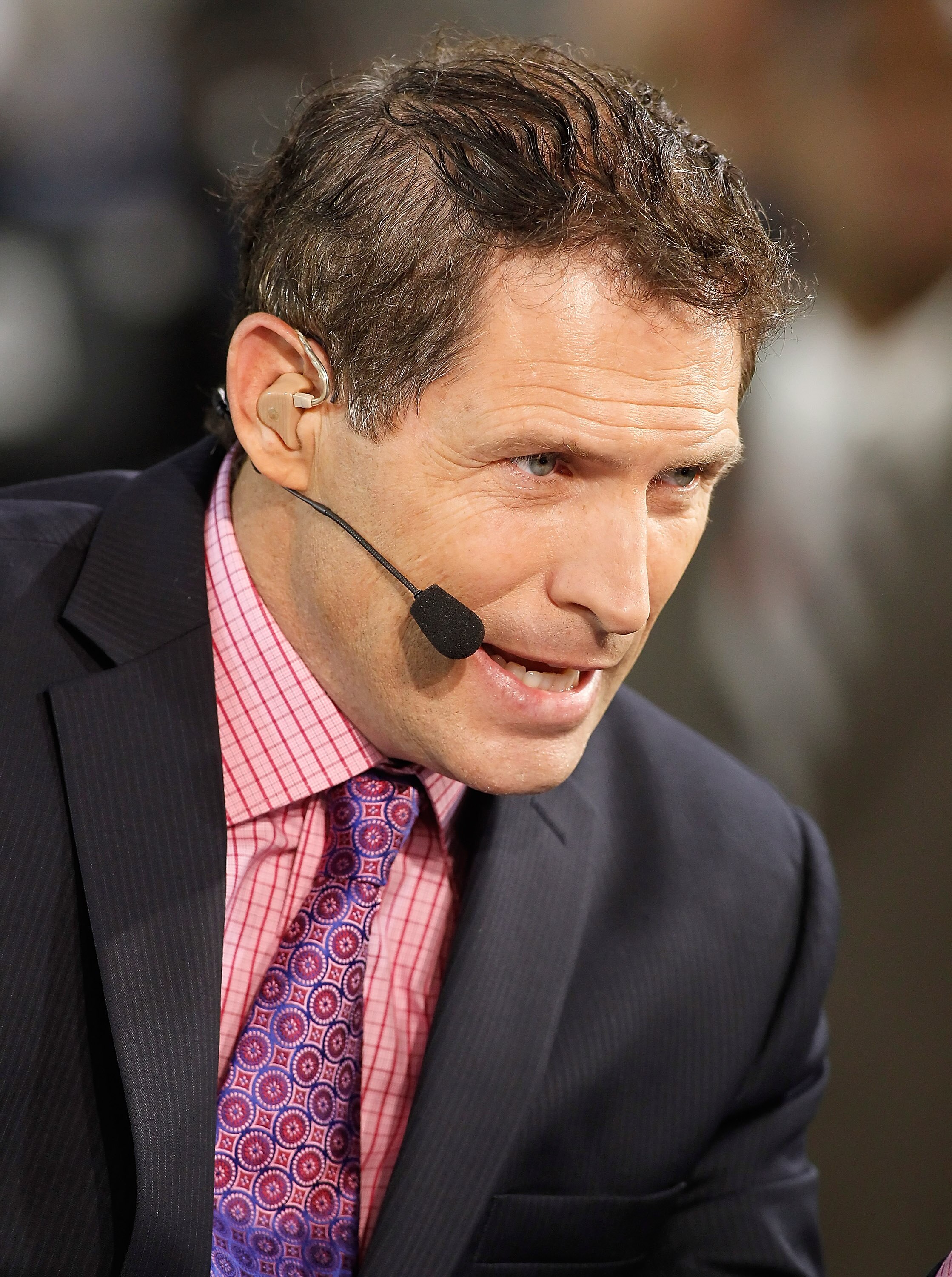 JACKSONVILLE, FL - OCTOBER 18:  Monday Night Football Analyst Steve Young talks just prior to the start of the game between the Jacksonville Jaguars and the Tennessee Titans at EverBank Field on October 18, 2010 in Jacksonville, Florida.  (Photo by J. Mer