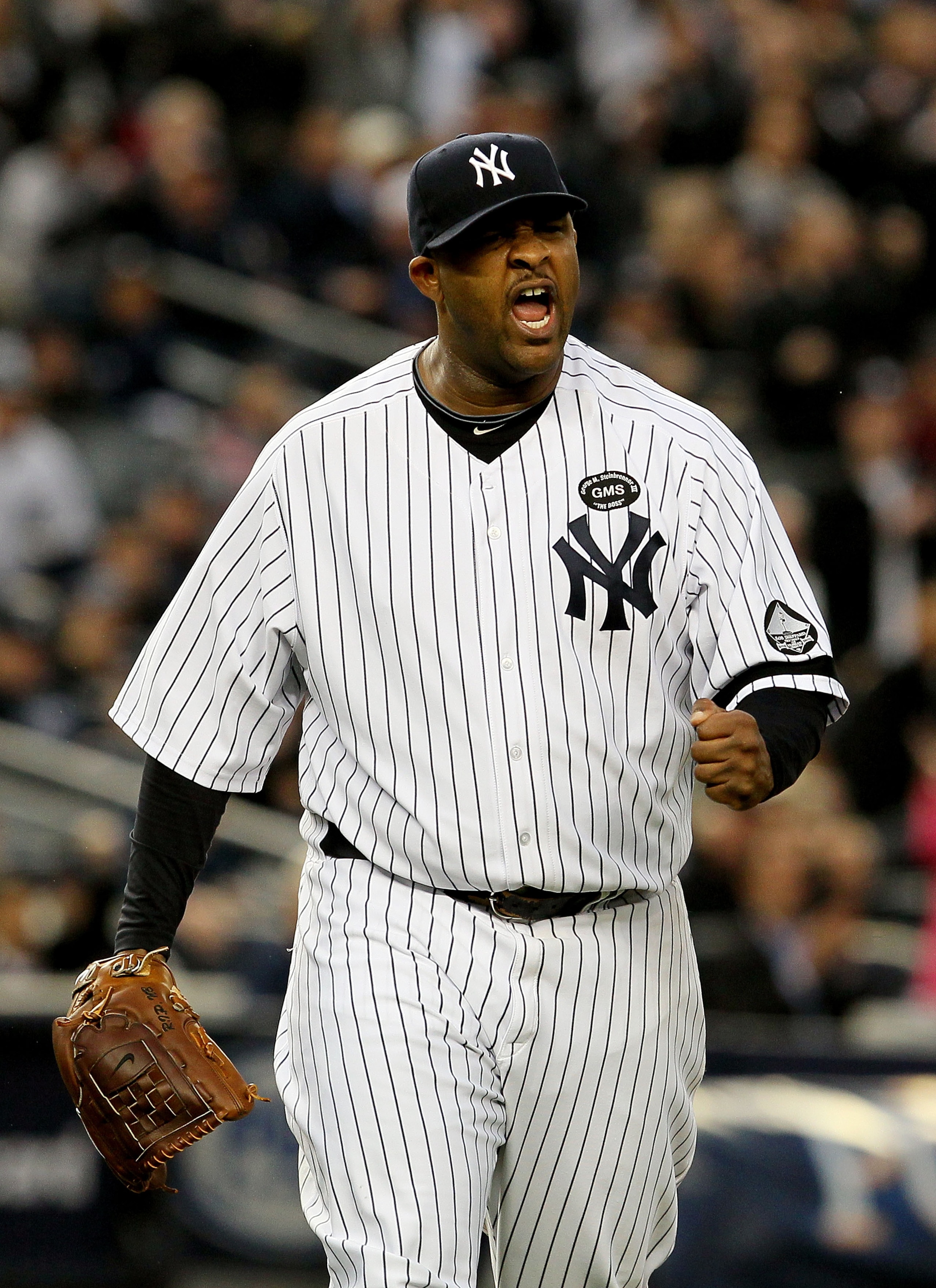 NEW YORK - OCTOBER 20: CC Sabathia #52 of the New York Yankees celebrates after he forced Josh Hamilton #32 of the Texas Rangers to ground into a double play to end the top of the fifth inning of Game Five of the ALCS during the 2010 MLB Playoffs at Yank NEW YORK - OCTOBER 20: CC Sabathia #52 of the New York Yankees celebrates after he forced Josh Hamilton #32 of the Texas Rangers to ground into a double play to end the top of the fifth inning of Game Five of the ALCS during the 2010 MLB Playoffs at Yank