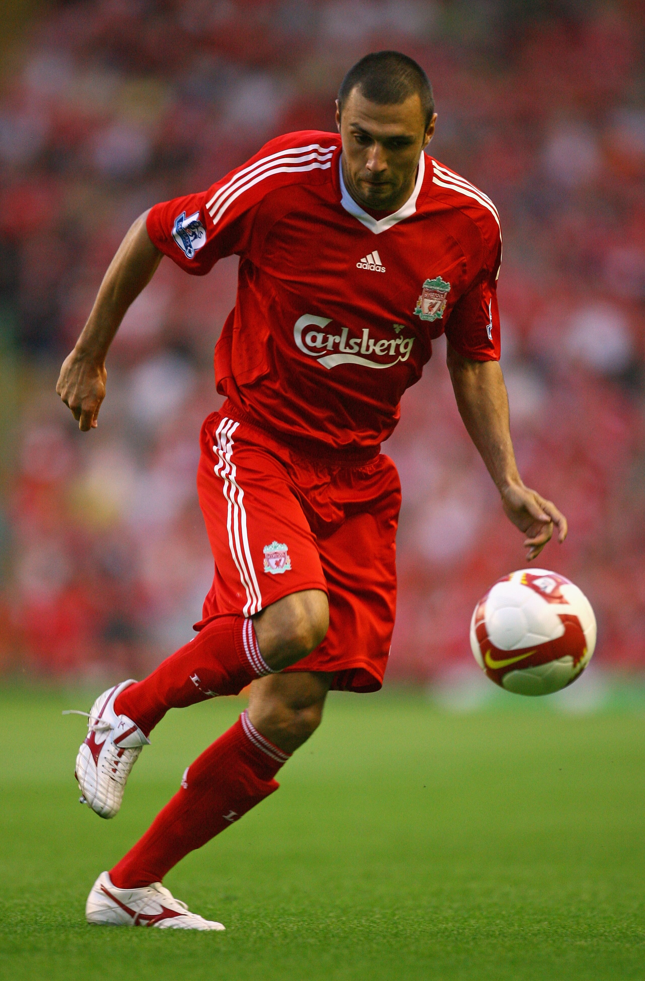 LIVERPOOL, UNITED KINGDOM - AUGUST 08:  Andrea Dossena of Liverpool during the pre season friendly match between Liverpool and Lazio at Anfield on August 8, 2008 in Liverpool, England.  (Photo by Alex Livesey/Getty Images)
