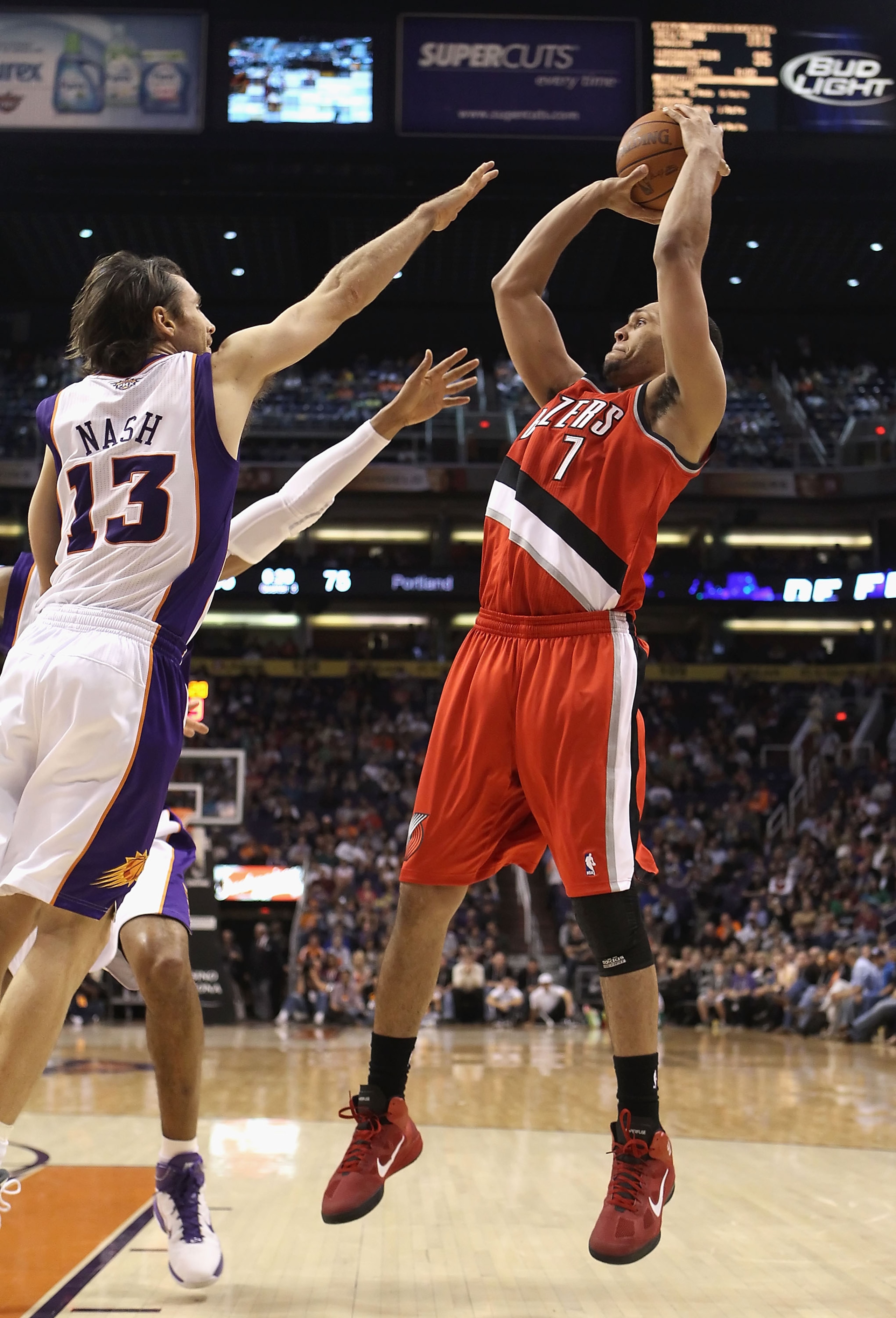 PHOENIX - DECEMBER 10:  Brandon Roy #7 of the Portland Trail Blazers puts up a shot over Steve Nash #13 of the Phoenix Suns during the NBA game at US Airways Center on December 10, 2010 in Phoenix, Arizona. The Trail Blazers defeated the Suns 101-94.  NOT