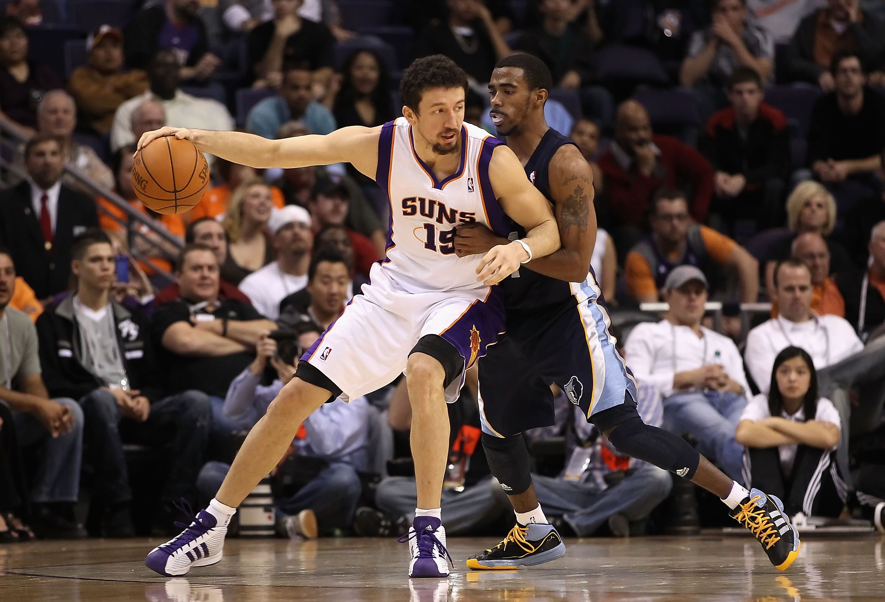 PHOENIX - DECEMBER 08:  Hedo Turkoglu #19 of the Phoenix Suns handles the ball during the NBA game against the Memphis Grizzlies at US Airways Center on December 8, 2010 in Phoenix, Arizona. NOTE TO USER: User expressly acknowledges and agrees that, by do