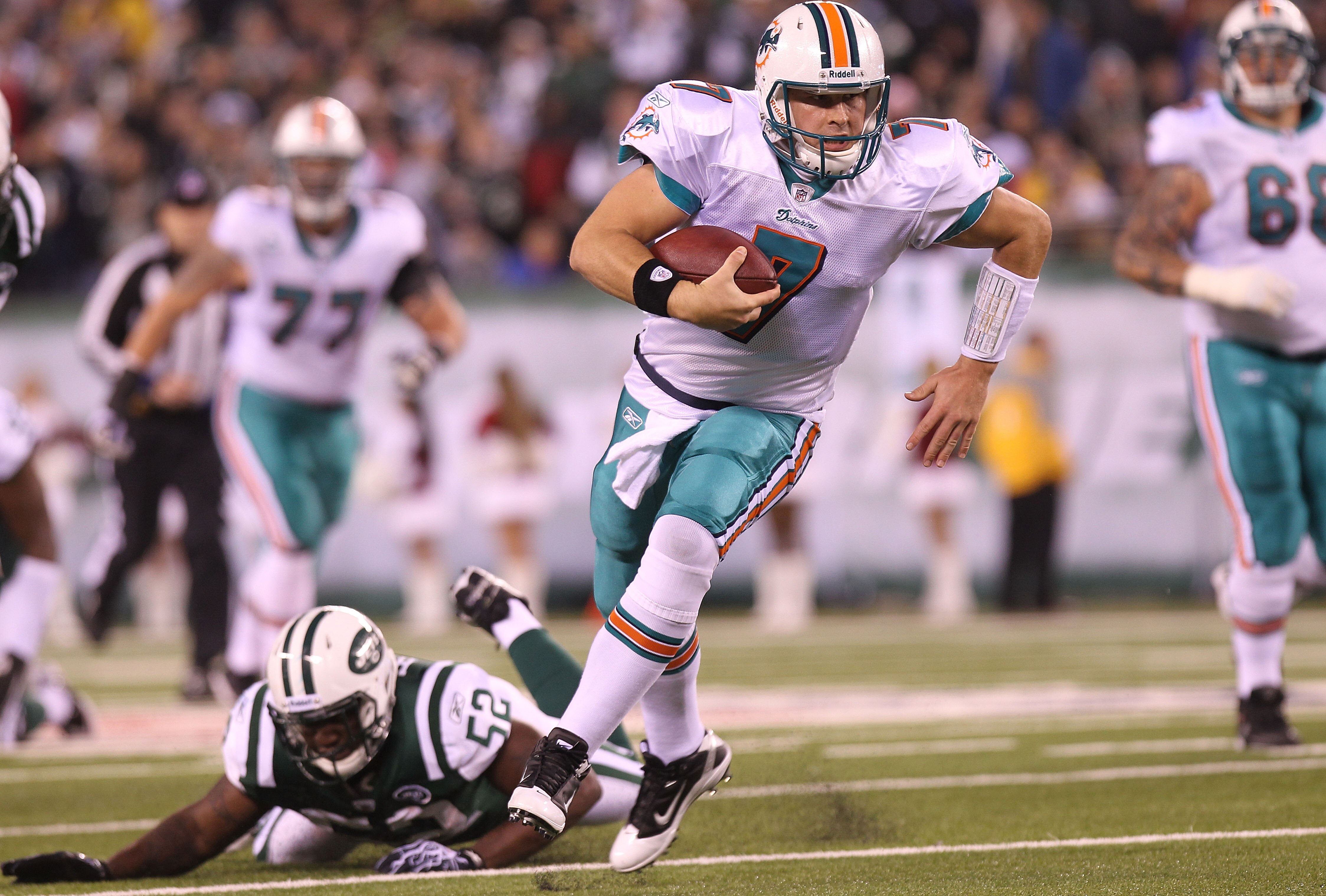 EAST RUTHERFORD, NJ - DECEMBER 12:  Chad Henne #7 of the Miami Dolphins scrambles from the pocket against the New York Jets at New Meadowlands Stadium on December 12, 2010 in East Rutherford, New Jersey.  (Photo by Nick Laham/Getty Images)