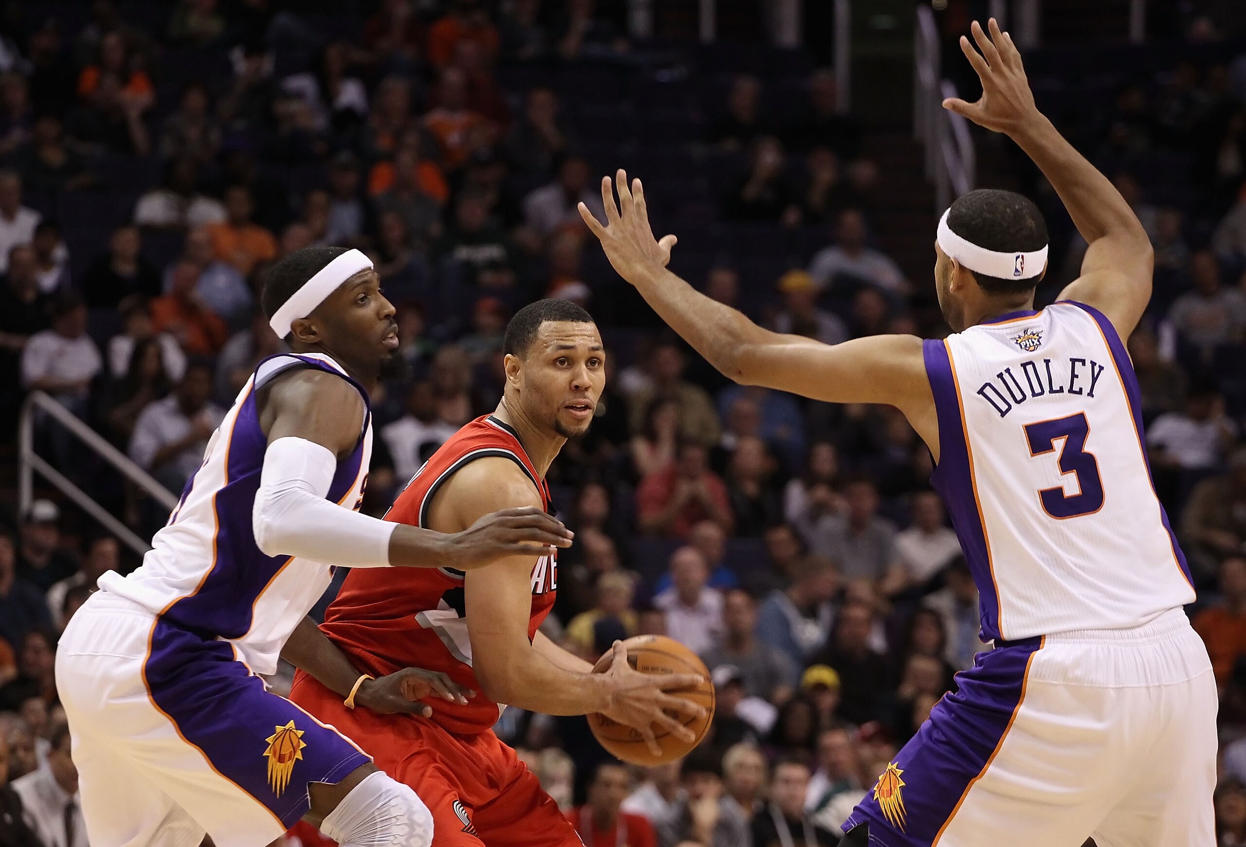 PHOENIX - DECEMBER 10:  Brandon Roy #7 of the Portland Trail Blazers looks to pass the ball during the NBA game against the Phoenix Suns at US Airways Center on December 10, 2010 in Phoenix, Arizona. The Trail Blazers defeated the Suns 101-94. NOTE TO USE