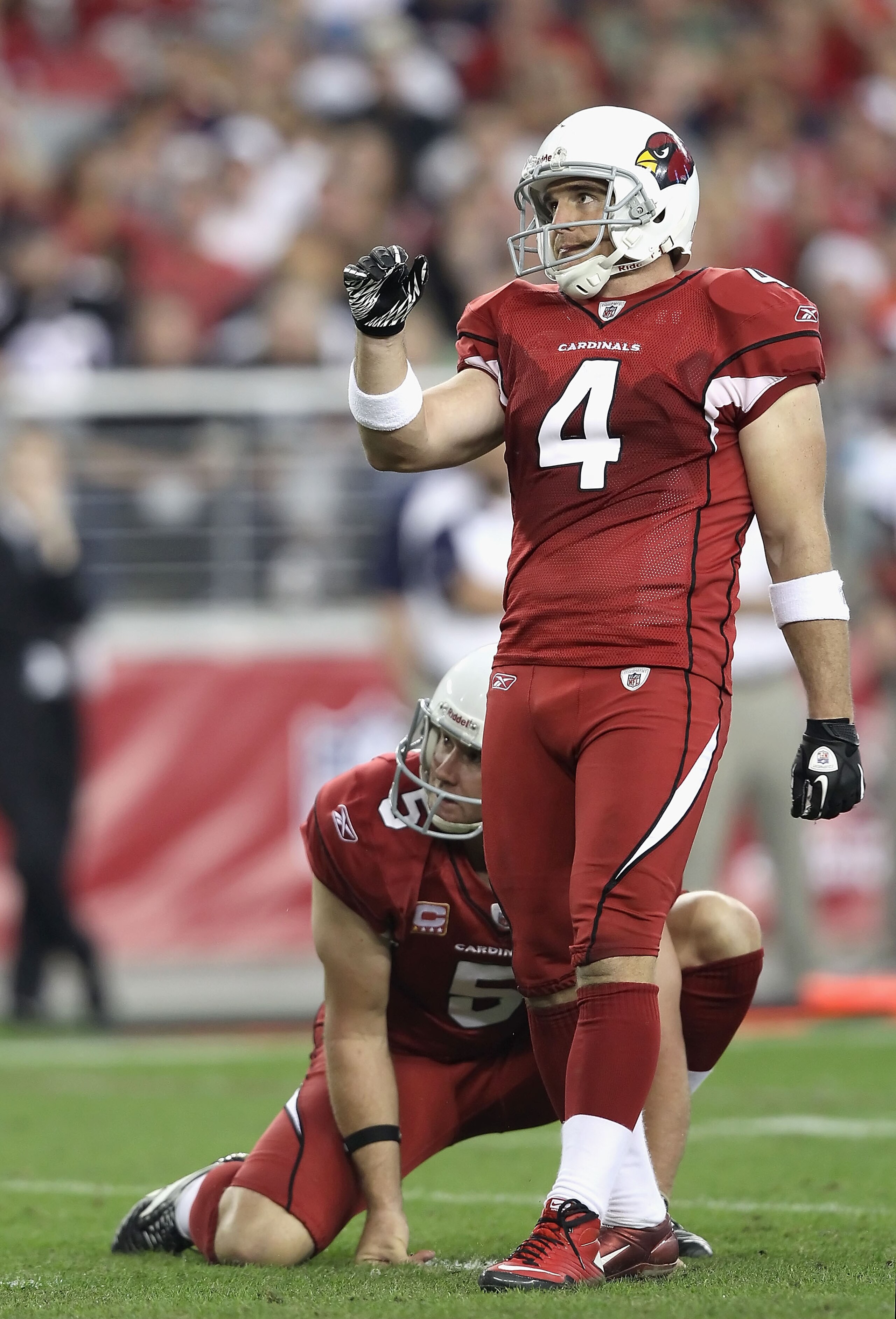 GLENDALE, AZ - DECEMBER 12:  Kicker Jay Feely #4 of the Arizona Cardinals kicks a field goal during the NFL game against the Denver Broncos at the University of Phoenix Stadium on December 12, 2010 in Glendale, Arizona. The Cardinals defeated the Broncos