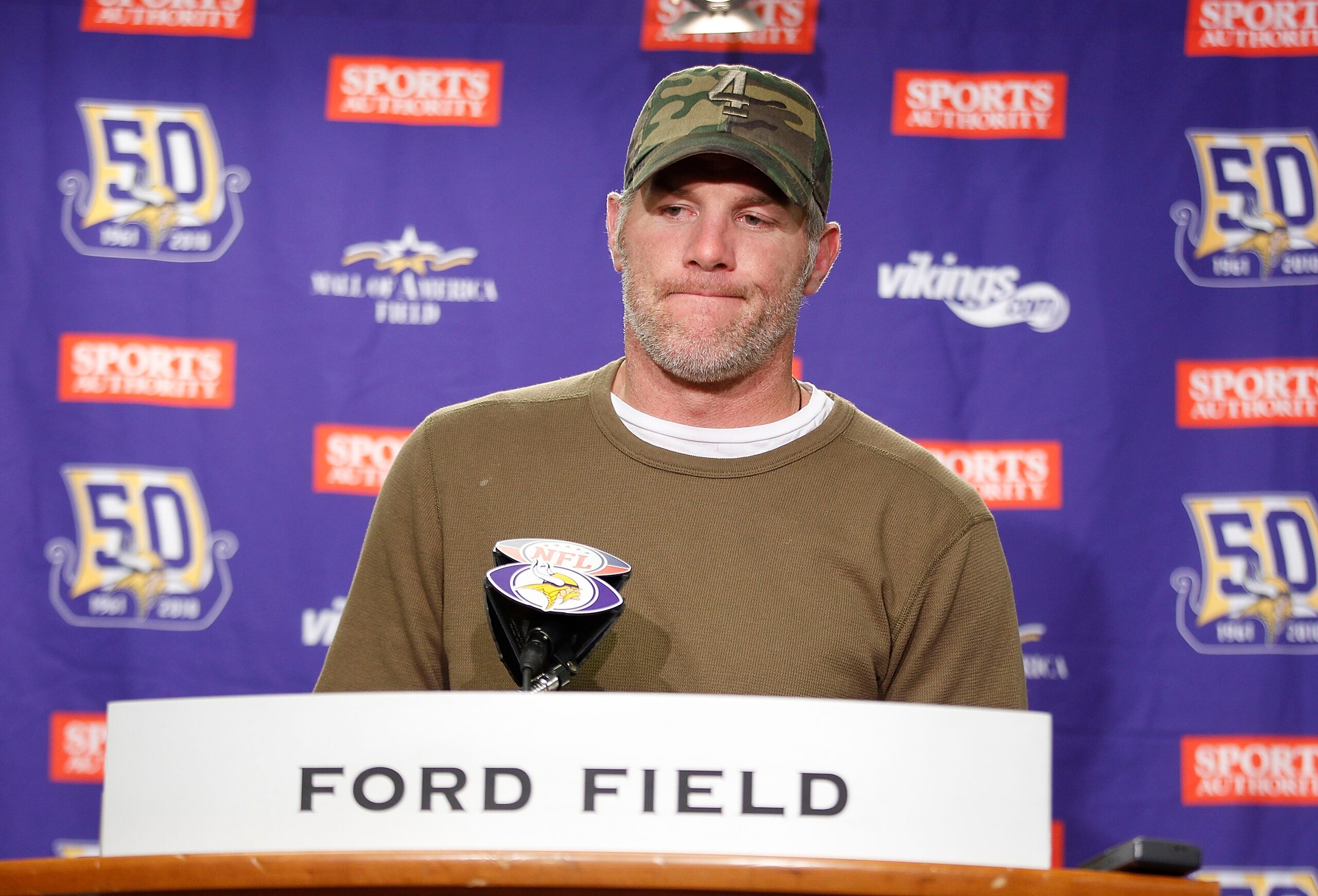 DETROIT, MI - DECEMBER 13:  Brett Favre #4 of the Minnesota Vikings talks to the media after the game against the New York Giants at Ford Field on December 13, 2010 in Detroit, Michigan. The Giants defeated the Vikings 21-3.  (Photo by Leon Halip/Getty Im