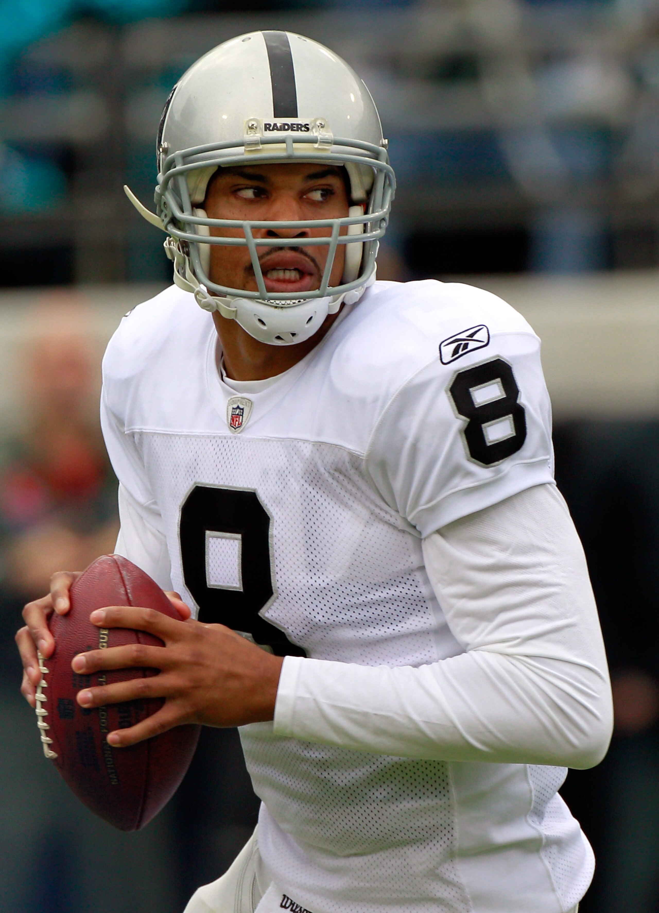 JACKSONVILLE, FL - DECEMBER 12:  Jason Campbell #8 of the Oakland Raiders attempts a pass during the game against the Jacksonville Jaguars at EverBank Field on December 12, 2010 in Jacksonville, Florida.  (Photo by Sam Greenwood/Getty Images)