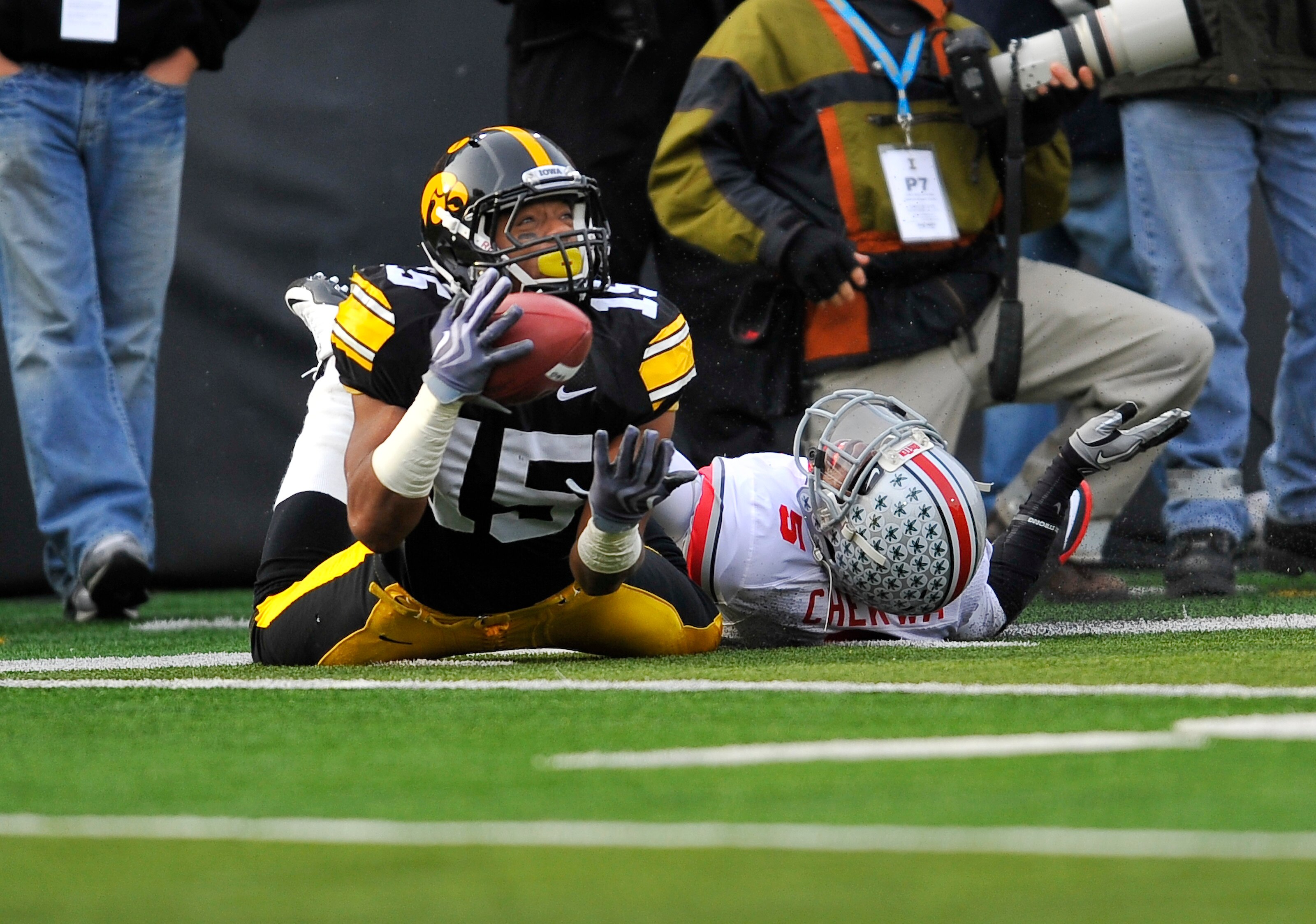IOWA CITY, IA - NOVEMBER 20: Wide receiver Derrell Johnson-Koulianos #15 pulls in a pass as defensive back Chimdi Chekwa #5 of the Ohio State Buckeyes defends during the first half of play at Kinnick Stadium on November 20, 2010 in Iowa City, Iowa. Ohio w