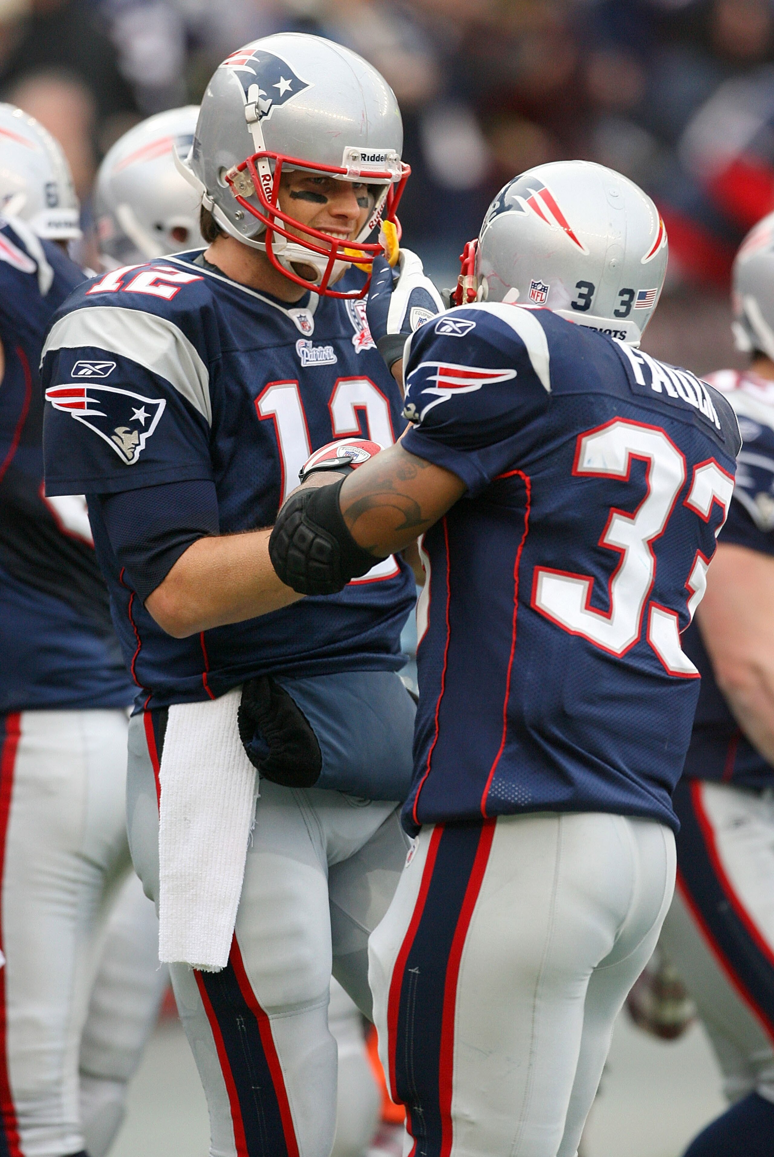 FOXBORO, MA - DECEMBER 27:  Tom Brady #12 of the New England Patriots celebrates with Kevin Faulk #33 after Brady threw a second touchdown pass to Randy Moss against the Jacksonville Jaguars at Gillette Stadium on December 27, 2009 in Foxboro, Massachuset