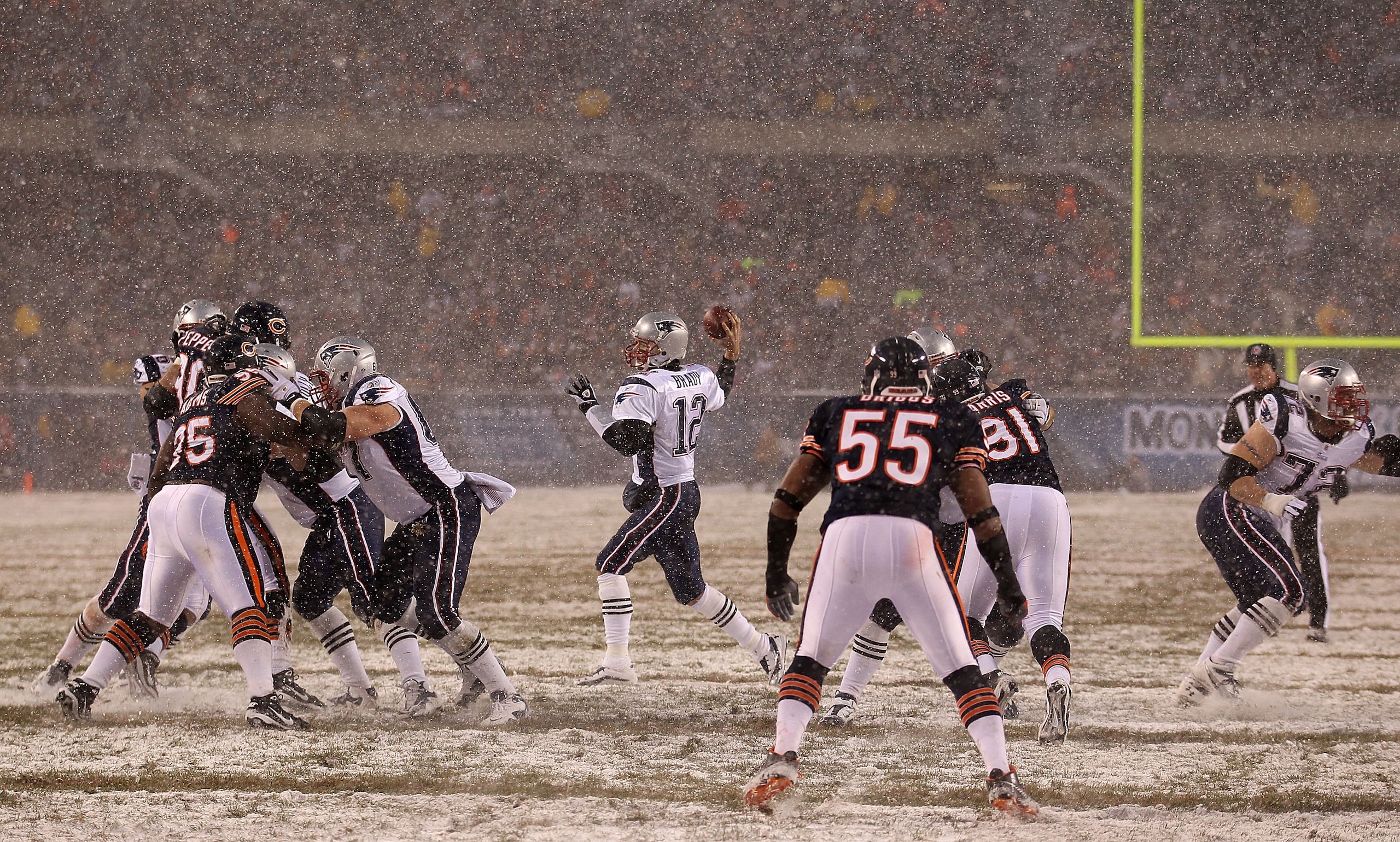 CHICAGO, IL - DECEMBER 12: Tom Brady #12 of the New England Patriots throws a pass against the Chicago Bears at Soldier Field on December 12, 2010 in Chicago, Illinois. The Patriots defeated the Bears 36-7. (Photo by Jonathan Daniel/Getty Images)