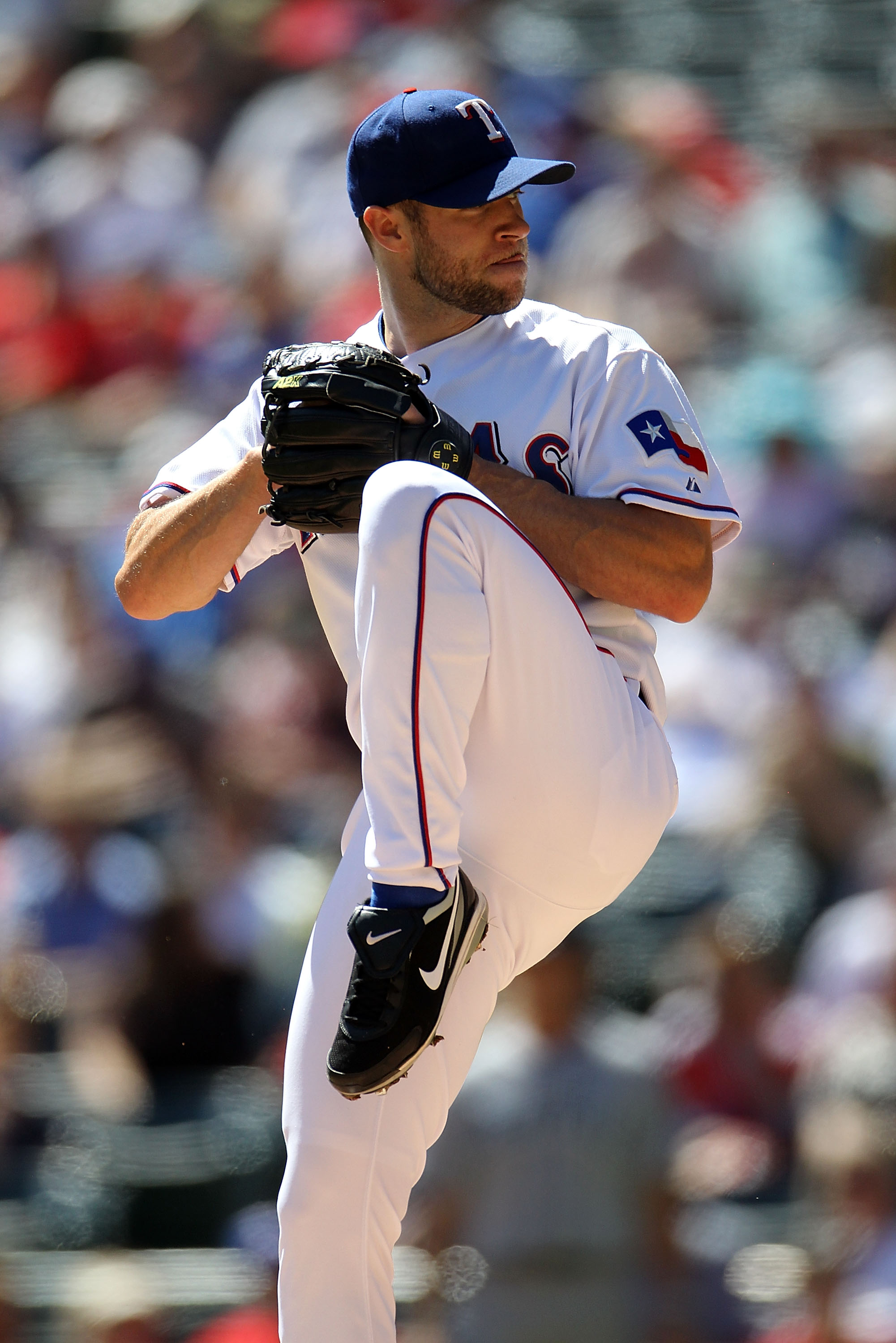 ARLINGTON, TX - SEPTEMBER 29:  Pitcher Rich Harden #40 of the Texas Rangers throws against the Seattle Mariners at Rangers Ballpark in Arlington on September 29, 2010 in Arlington, Texas.  (Photo by Ronald Martinez/Getty Images)