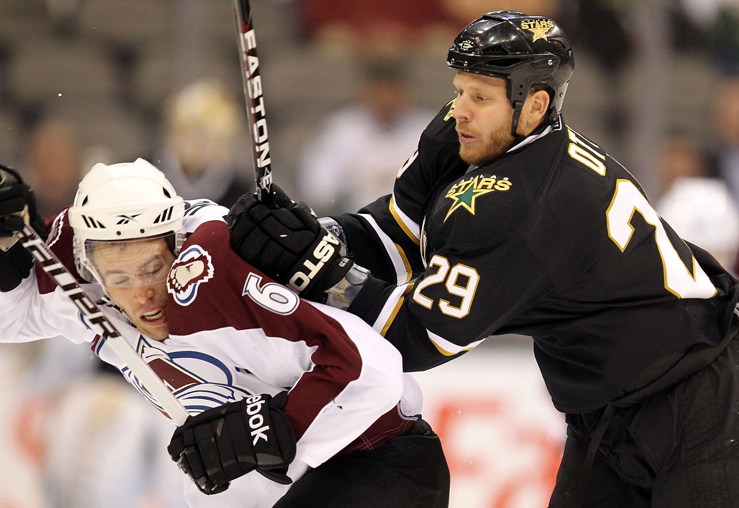 DALLAS - SEPTEMBER 30:  Center Steve Ott #29 of the Dallas Stars checks Jonas Holos #6 of the Colorado Avalanche in the first period at American Airlines Center on September 30, 2010 in Dallas, Texas.  (Photo by Ronald Martinez/Getty Images)