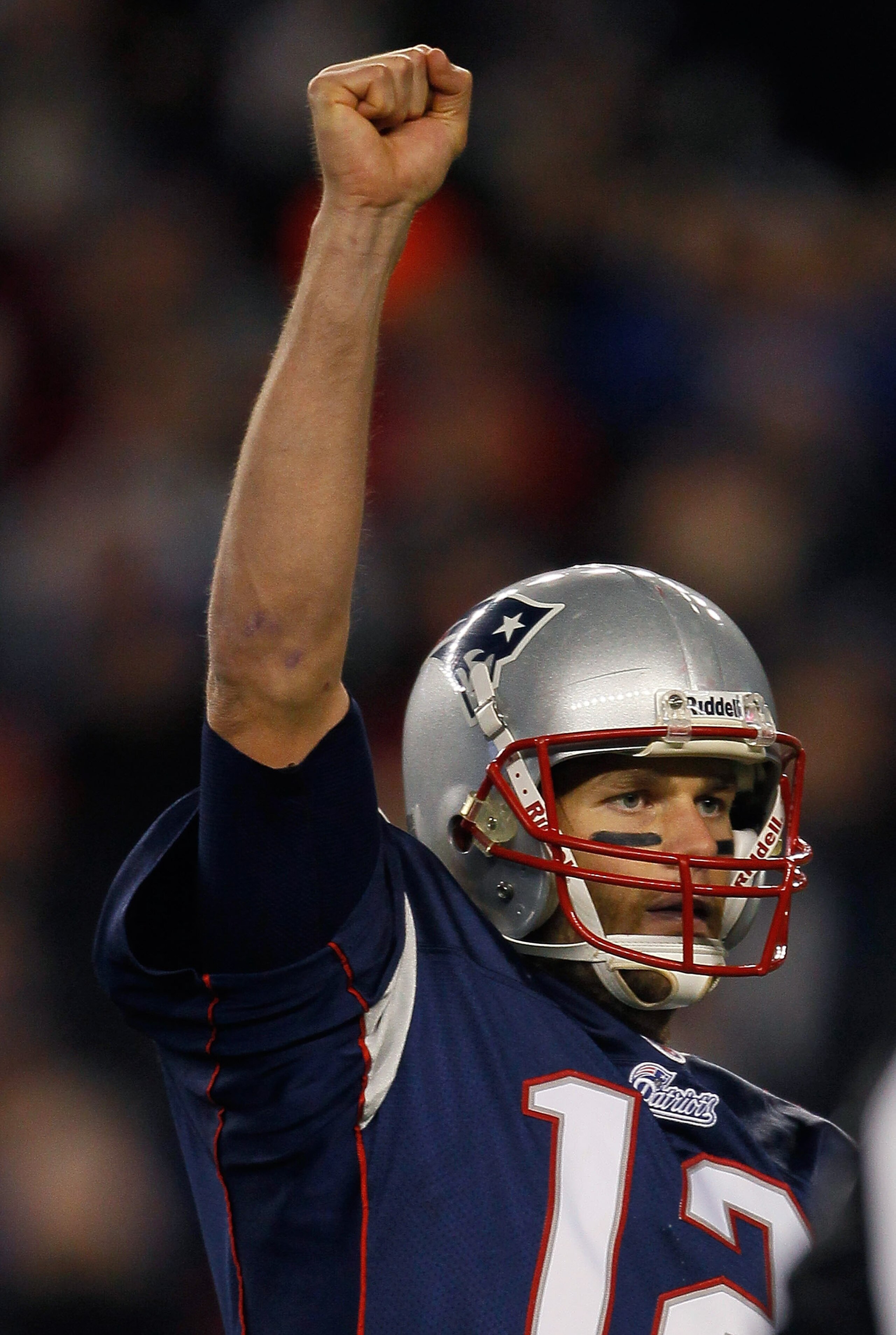 FOXBORO, MA - NOVEMBER 21: Tom Brady #12 of the New England Patriots reacts after teammate BenJarvis Green-Ellis runs the ball in for a touchdown in the second half at Gillette Stadium on November 21, 2010 in Foxboro, Massachusetts. (Photo by Jim Rogash/G