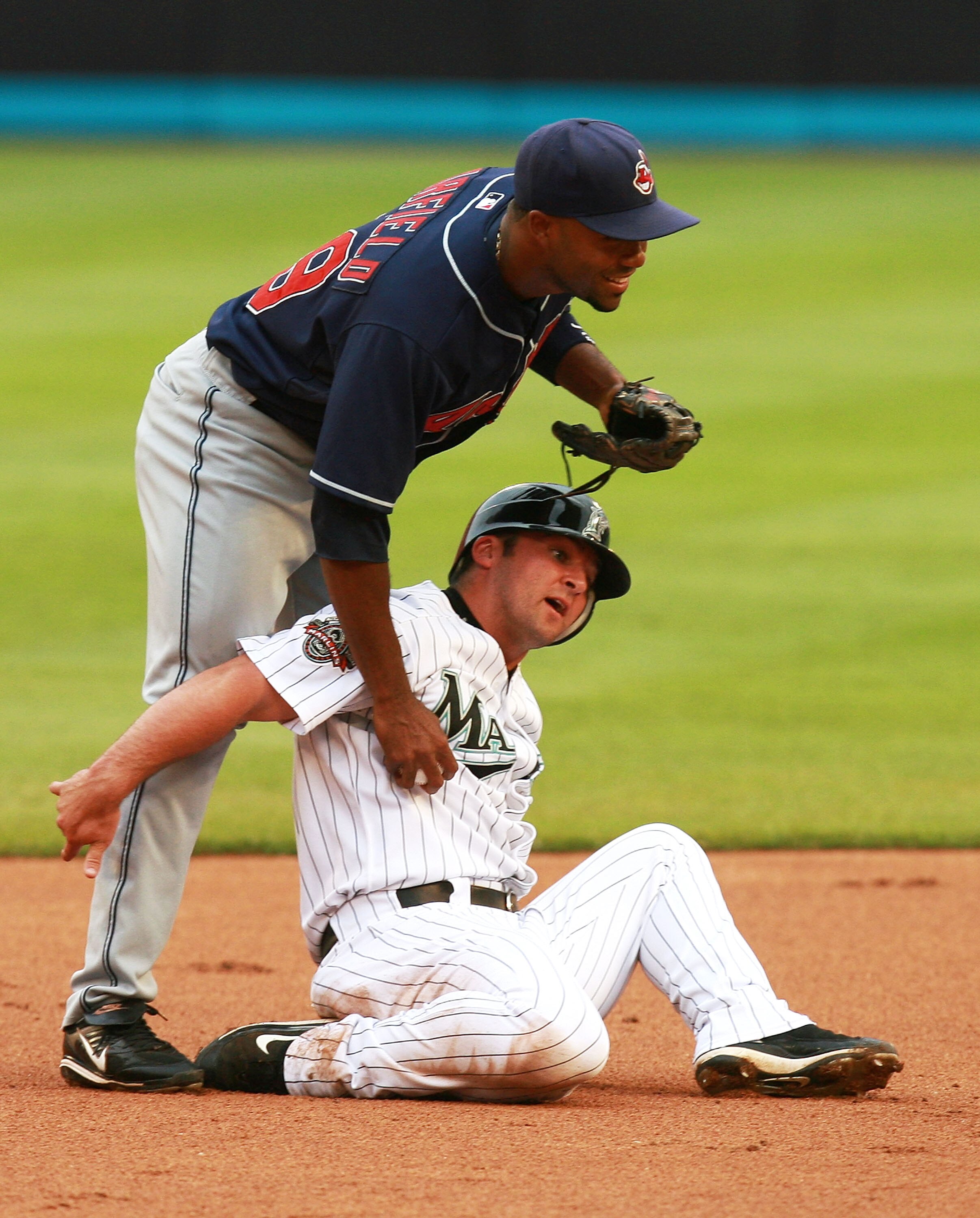 MIAMI - JUNE 12:   Second baseman Josh Barfield #29 of the Cleveland Indians gets tangled up with Dan Uggla #6 of the Florida Marlins, as Uggla breaks up a double play during interleague play at Dolphin Stadium on June 12, 2007 in Miami, Florida.  (Photo