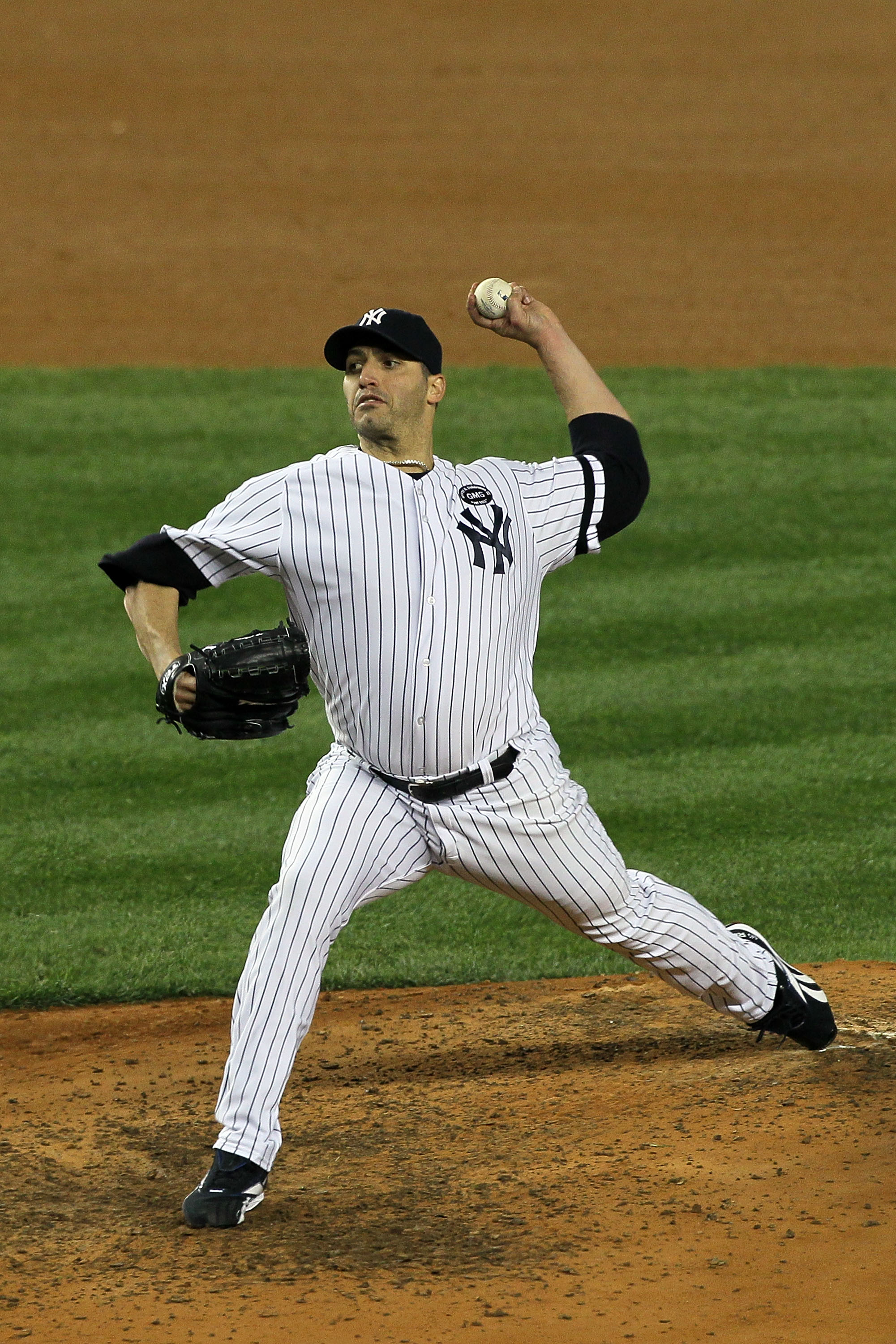 NEW YORK - OCTOBER 18:  Starting pitcher Andy Pettitte #46 of the New York Yankees pitches against the Texas Rangers in Game Three of the ALCS during the 2010 MLB Playoffs at Yankee Stadium on October 18, 2010 in New York, New York. The Raners won 8-0.  (
