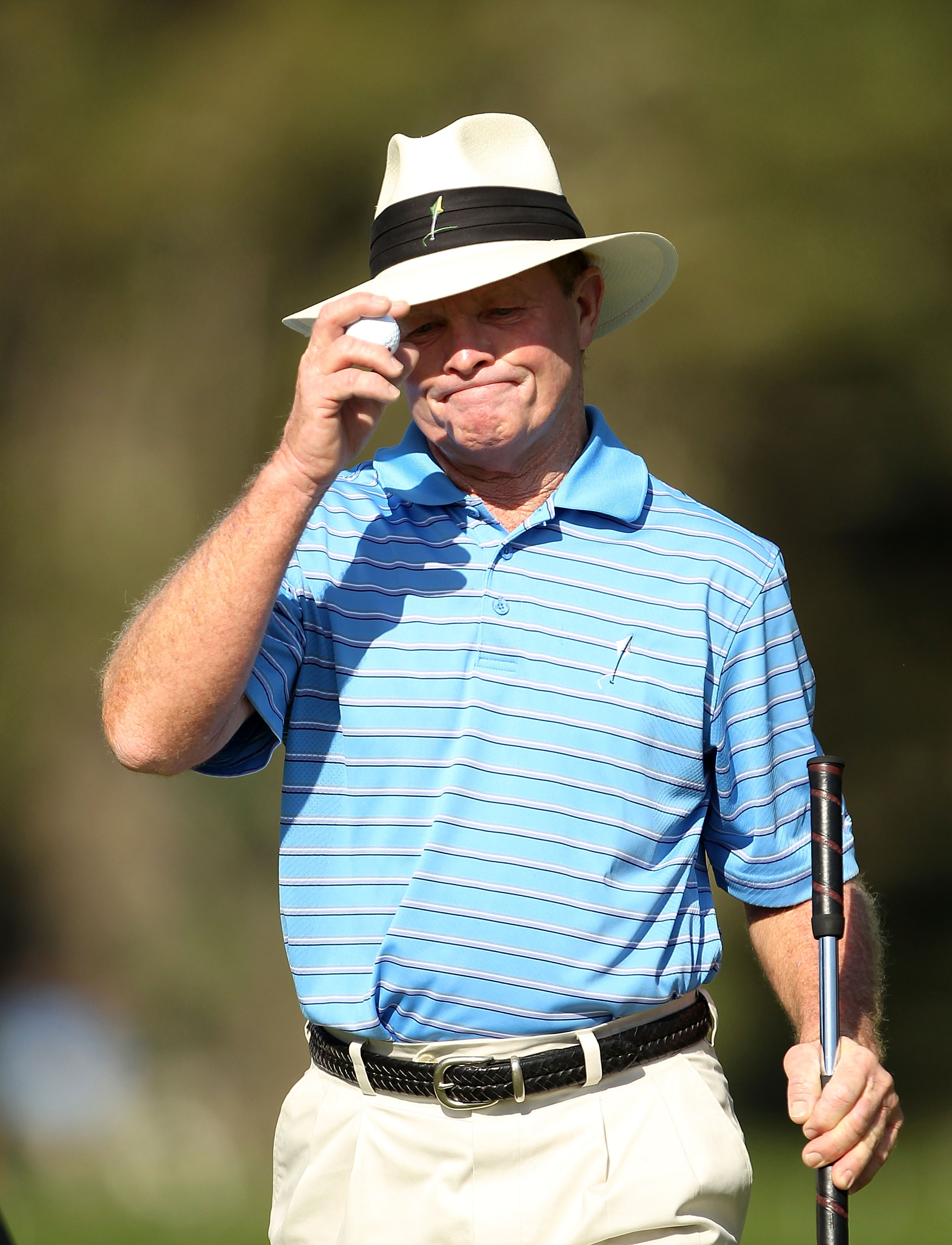 SAN FRANCISCO - NOVEMBER 06:  Tom Kite tips his hat after making par on the 3rd hole during round 3 of the Charles Schwab Cup Championship at Harding Park Golf Course on November 6, 2010 in San Francisco, California.  (Photo by Ezra Shaw/Getty Images)
