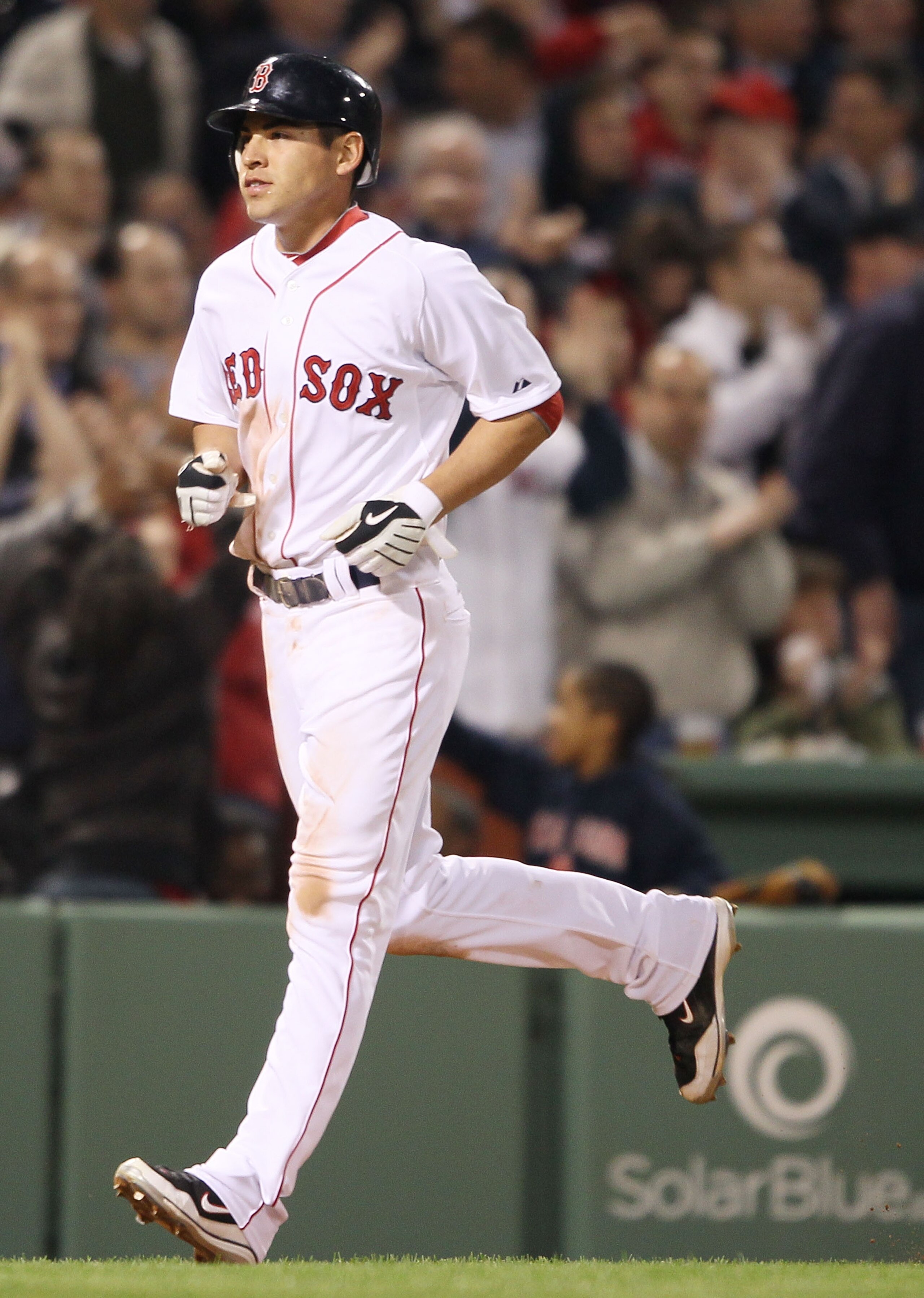BOSTON - APRIL 06:  Jacoby Ellsbury #2 of the Boston Red Sox heads for home after teammate Victor Martinez hit a two run homer in the third inning against the New York Yankees on April 6, 2010 at Fenway Park in Boston, Massachusetts.  (Photo by Elsa/Getty
