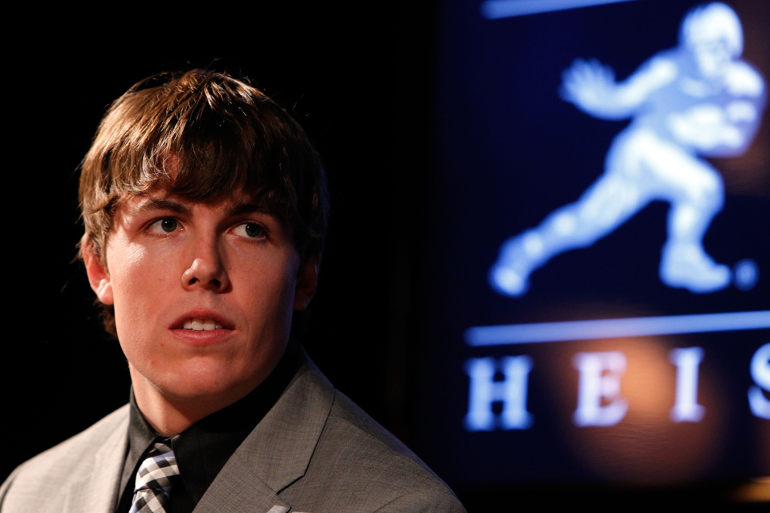 NEW YORK, NY - DECEMBER 11:  Kellen Moore of the Boise State University Broncos looks on during a press conference for Heisman Trophy candidates at The New York Marriott Marquis on December 11, 2010 in New York City.  (Photo by Jeff Zelevansky/Getty Image
