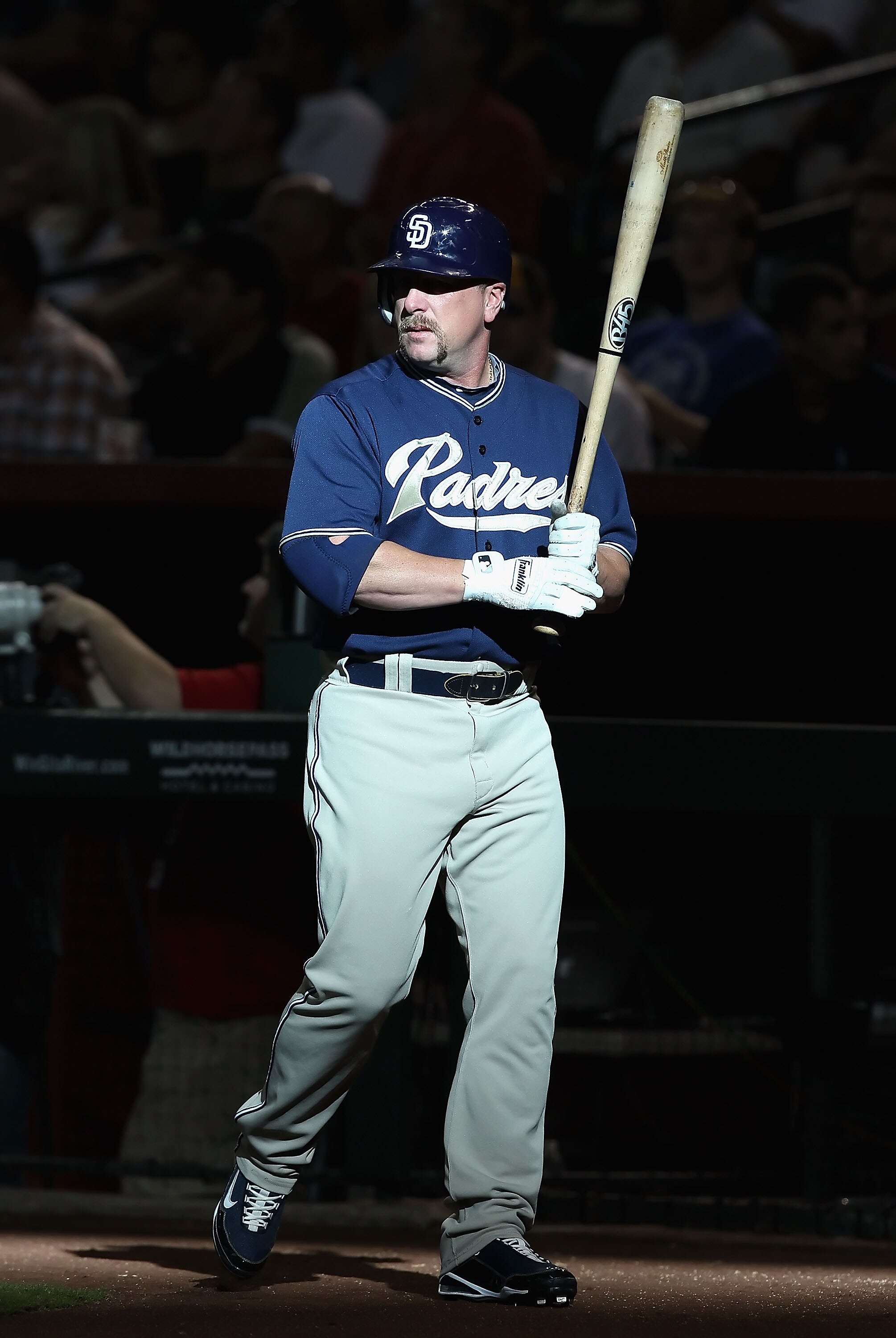 PHOENIX - SEPTEMBER 01:  Matt Stairs #16 of the San Diego Padres warms up on deck during the Major League Baseball game against the Arizona Diamondbacks at Chase Field on September 1, 2010 in Phoenix, Arizona.  The Diamondbacks defeated the Padres 5-2.  (