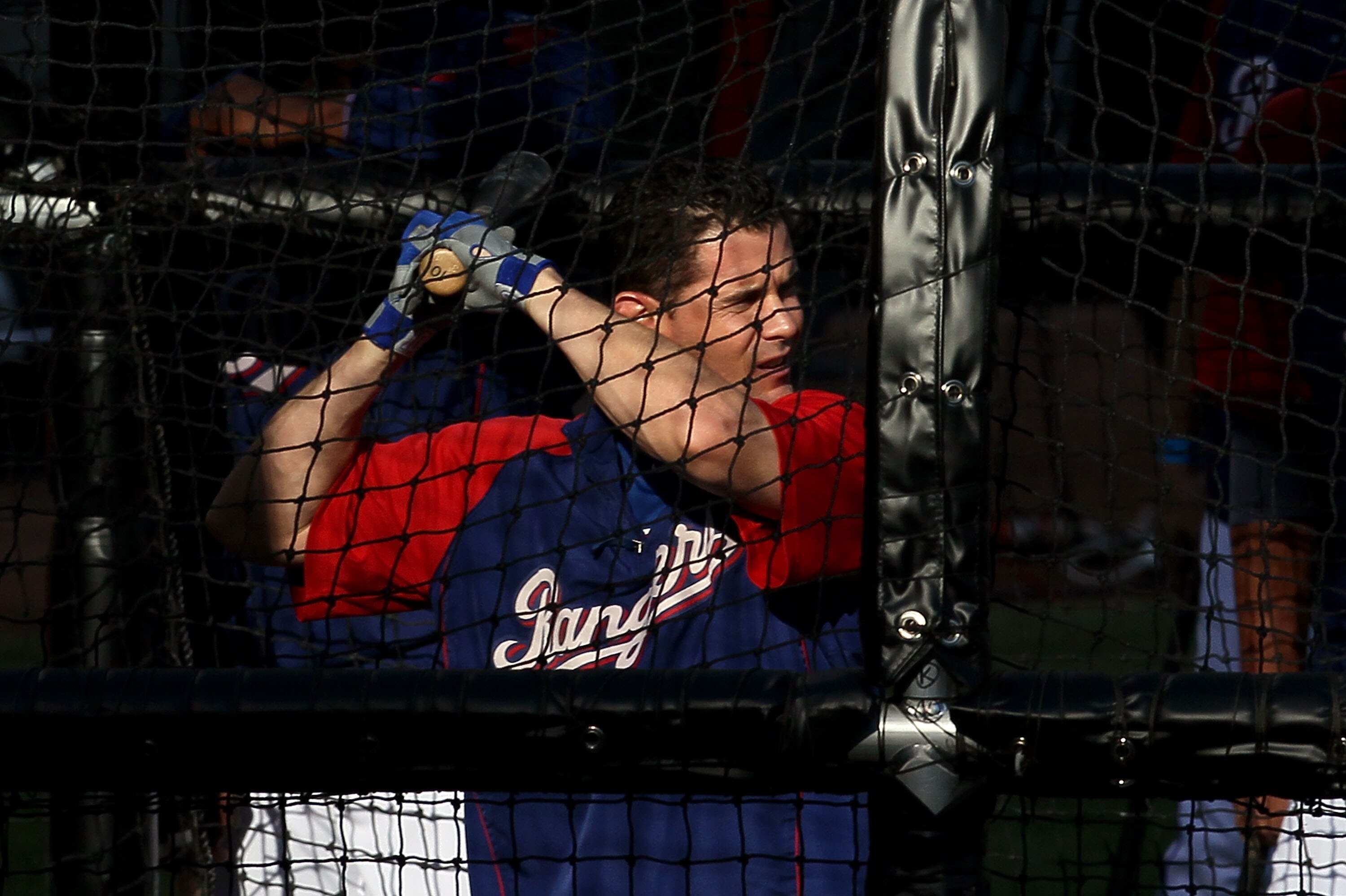 ARLINGTON, TX - NOVEMBER 01:  Michael Young #10 of the Texas Rangers takes batting practice against the San Francisco Giants in Game Five of the 2010 MLB World Series at Rangers Ballpark in Arlington on November 1, 2010 in Arlington, Texas.  (Photo by Ste