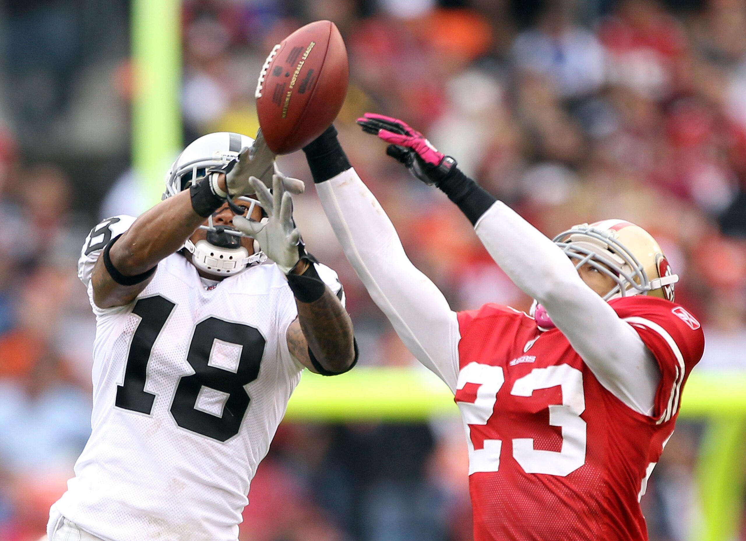 SAN FRANCISCO - OCTOBER 17:  Taylor Mays #23 of the San Francisco 49ers breaks up a pass intended for Louis Murphy #18 of the Oakland Raiders at Candlestick Park on October 17, 2010 in San Francisco, California.  (Photo by Ezra Shaw/Getty Images)