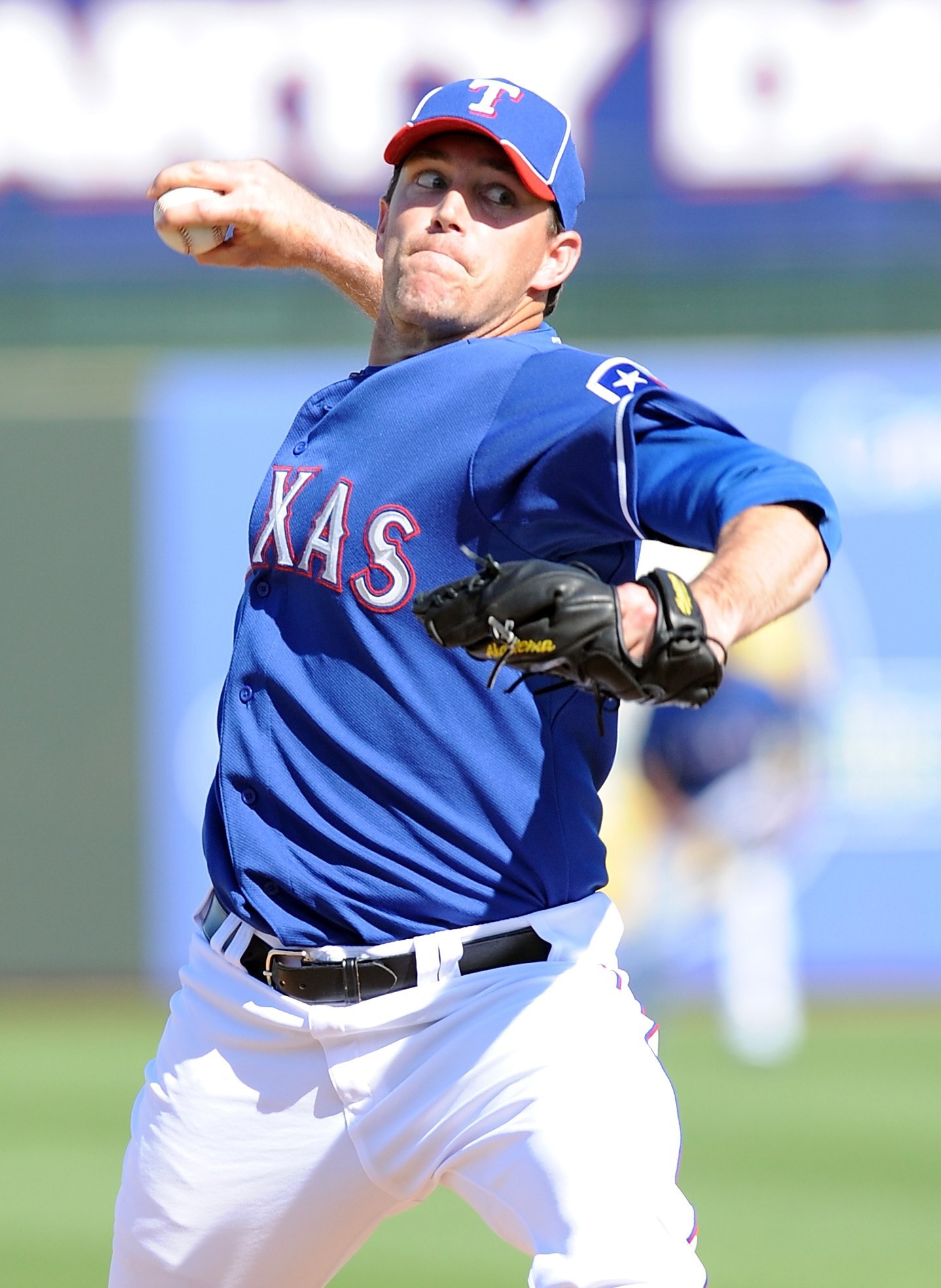SURPRISE, AZ - MARCH 06:  Willie Eyre #55 of the Texas Rangers pitches during a Spring Training game against the Kansas City Royals on March 6, 2010 in Surprise, Arizona.  (Photo by Lisa Blumenfeld/Getty Images)