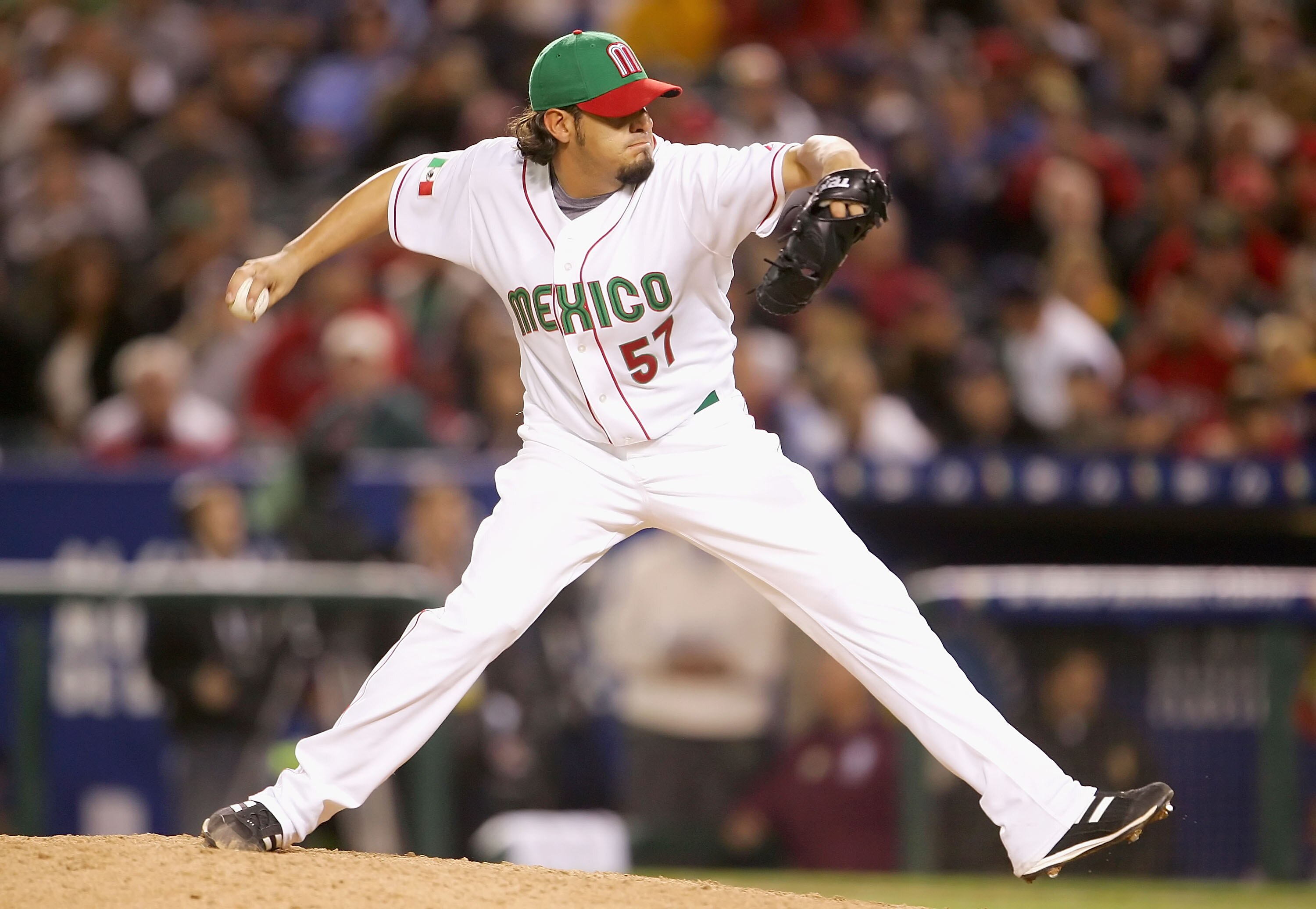 ANAHEIM, CA - MARCH 16:  Pitcher Oscar Villareal #57 of Team Mexico pitches against Team USA during the Round 2 Pool 2 Game of the World Baseball Classic at Angel Stadium on March 16, 2006 in Anaheim, California. Mexico defeated USA 2-1. (Photo by Jeff Gr