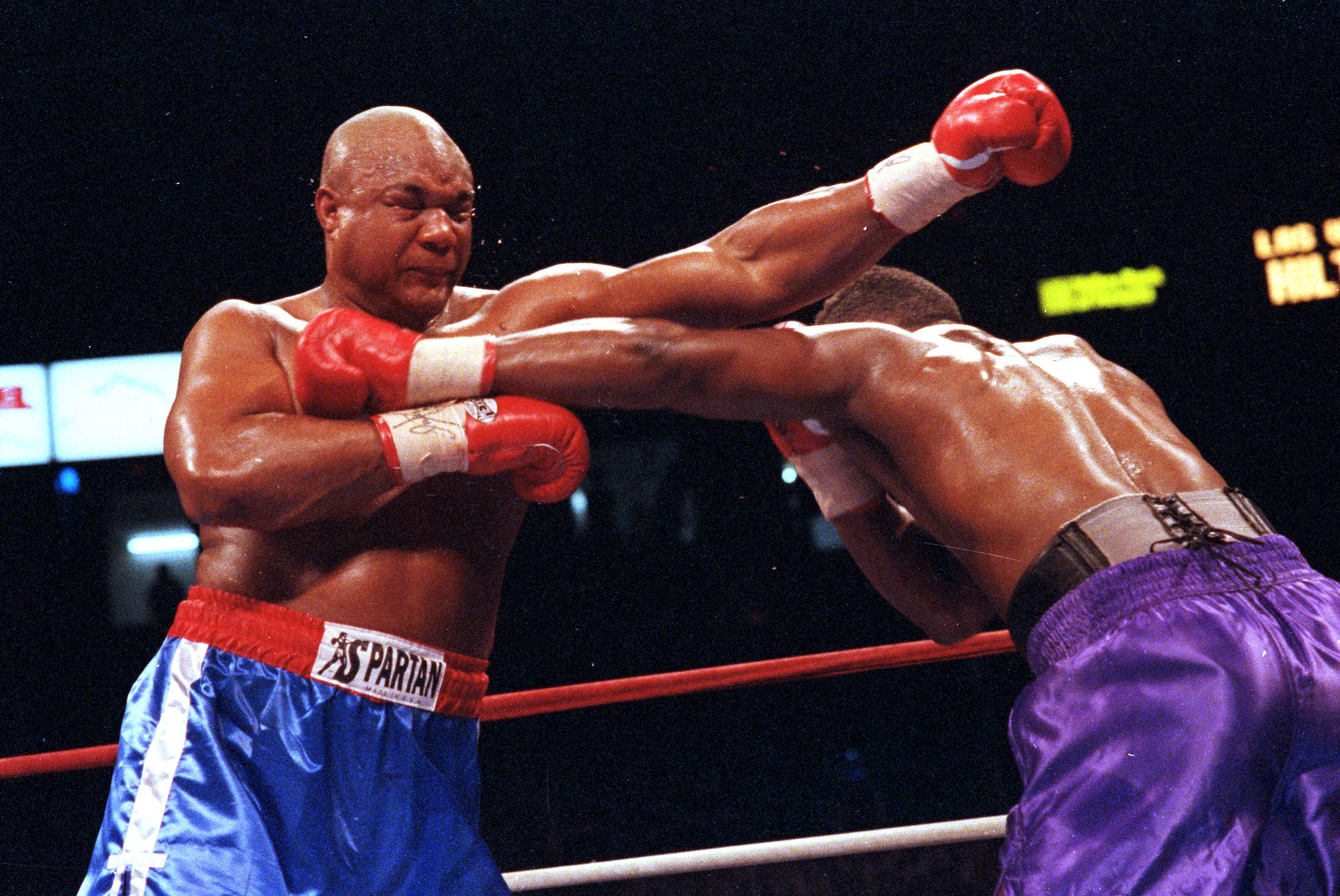 11 Apr 1991: George Foreman throws a left punch during a fight against Alex Stewart. Mandatory Credit: Holly  Stein  /Allsport