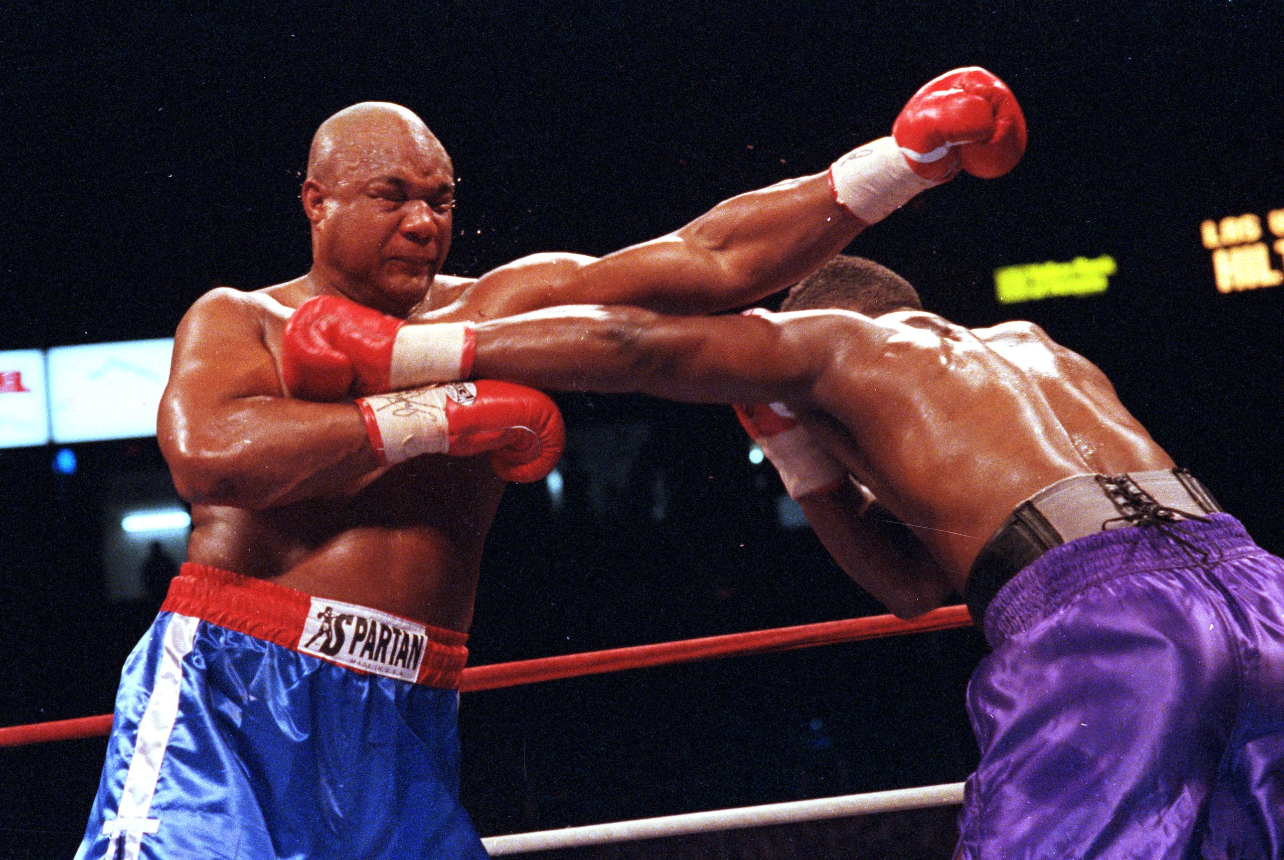11 Apr 1991: George Foreman throws a left punch during a fight against Alex Stewart. Mandatory Credit: Holly  Stein  /Allsport
