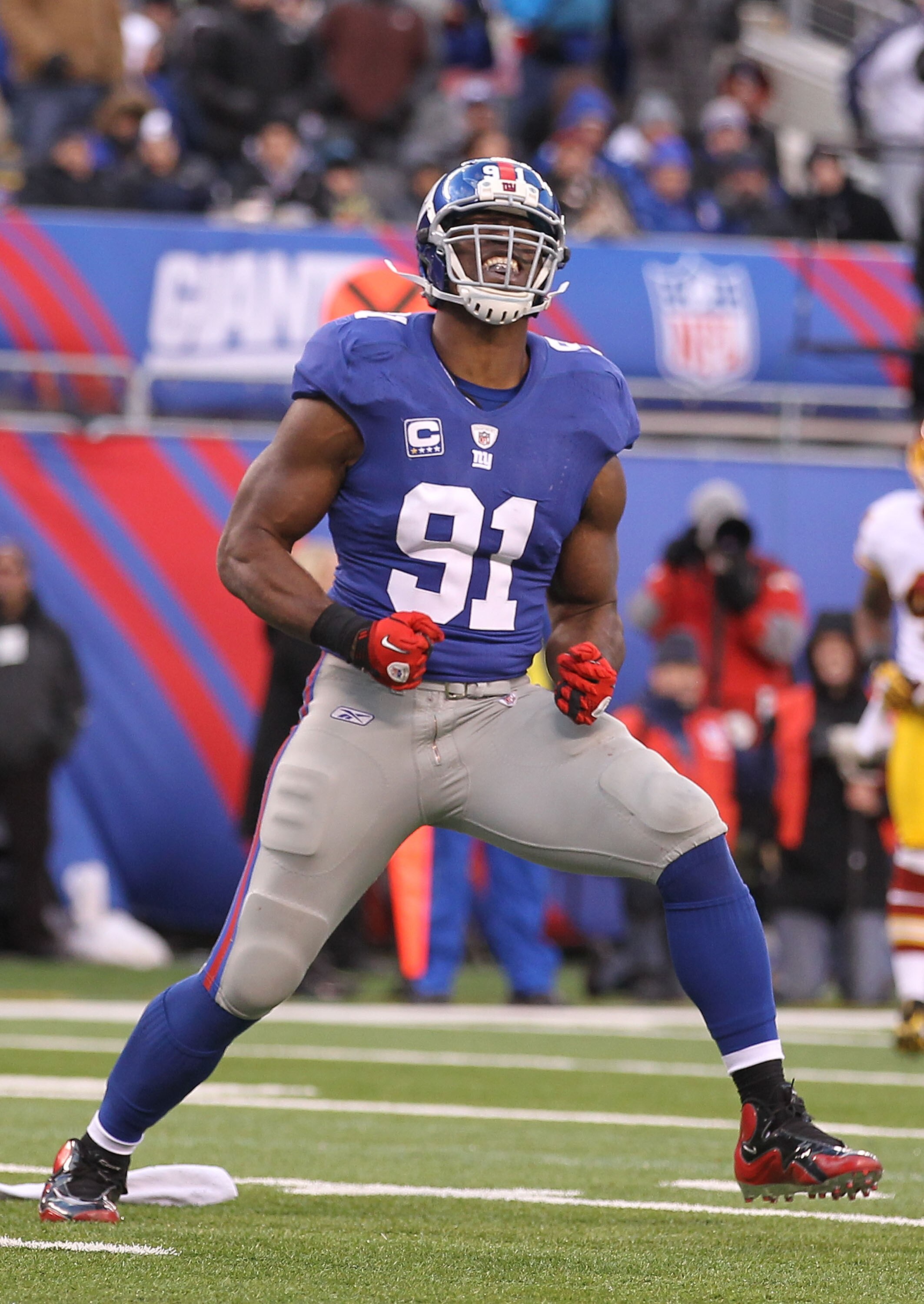 EAST RUTHERFORD, NJ - DECEMBER 05: Justin Tuck #91 of the New York Giants celebrates after sacking Donovan McNabb #5 of the Washington Redskins who fumbled and loset the ball during their game on December 5, 2010 at The New Meadowlands Stadium in East R EAST RUTHERFORD, NJ - DECEMBER 05: Justin Tuck #91 of the New York Giants celebrates after sacking Donovan McNabb #5 of the Washington Redskins who fumbled and loset the ball during their game on December 5, 2010 at The New Meadowlands Stadium in East R