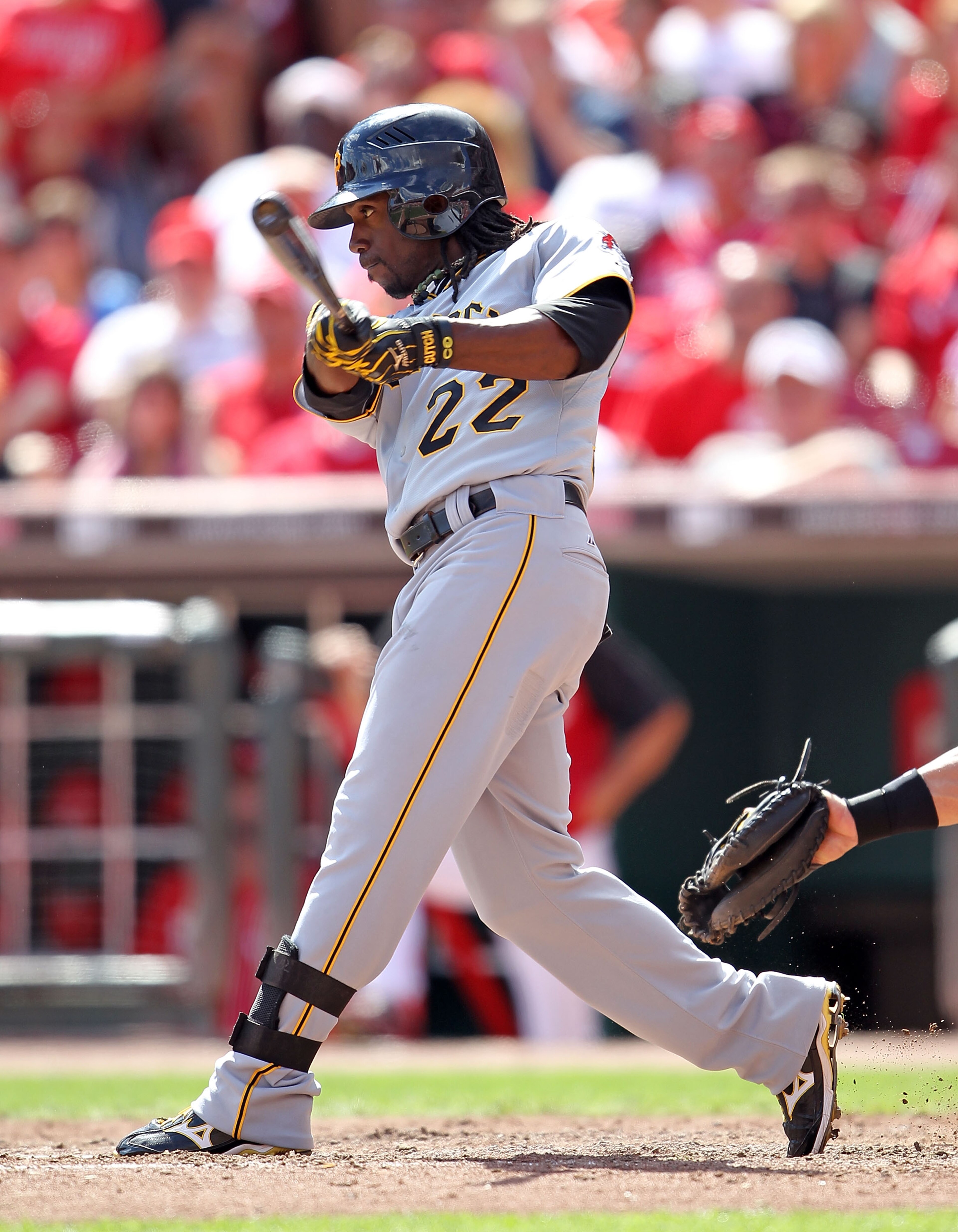 CINCINNATI - SEPTEMBER 12: Andrew McCutchen #22 of the Pittsburgh Pirates swings at a pitch during the game against the Cincinnati Reds at Great American Ballpark on September 12, 2010 in Cincinnati, Ohio. He hit a three run double in the ninth inning to CINCINNATI - SEPTEMBER 12: Andrew McCutchen #22 of the Pittsburgh Pirates swings at a pitch during the game against the Cincinnati Reds at Great American Ballpark on September 12, 2010 in Cincinnati, Ohio. He hit a three run double in the ninth inning to