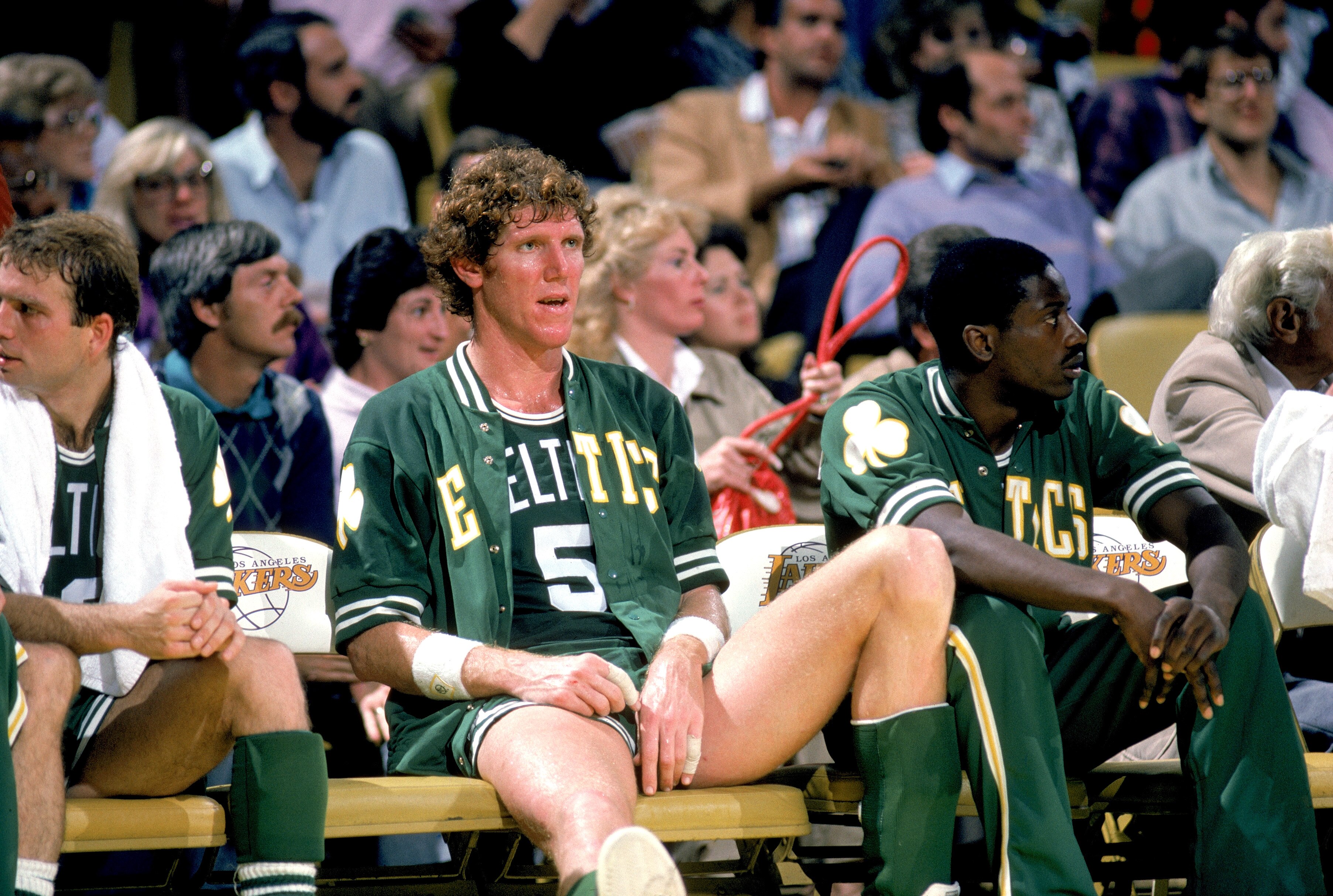 1985: Bill Walton #5 of the Boston Celtics rest on the bench during a game circa 1985. (Photo by Rick Stewart/Getty Images)