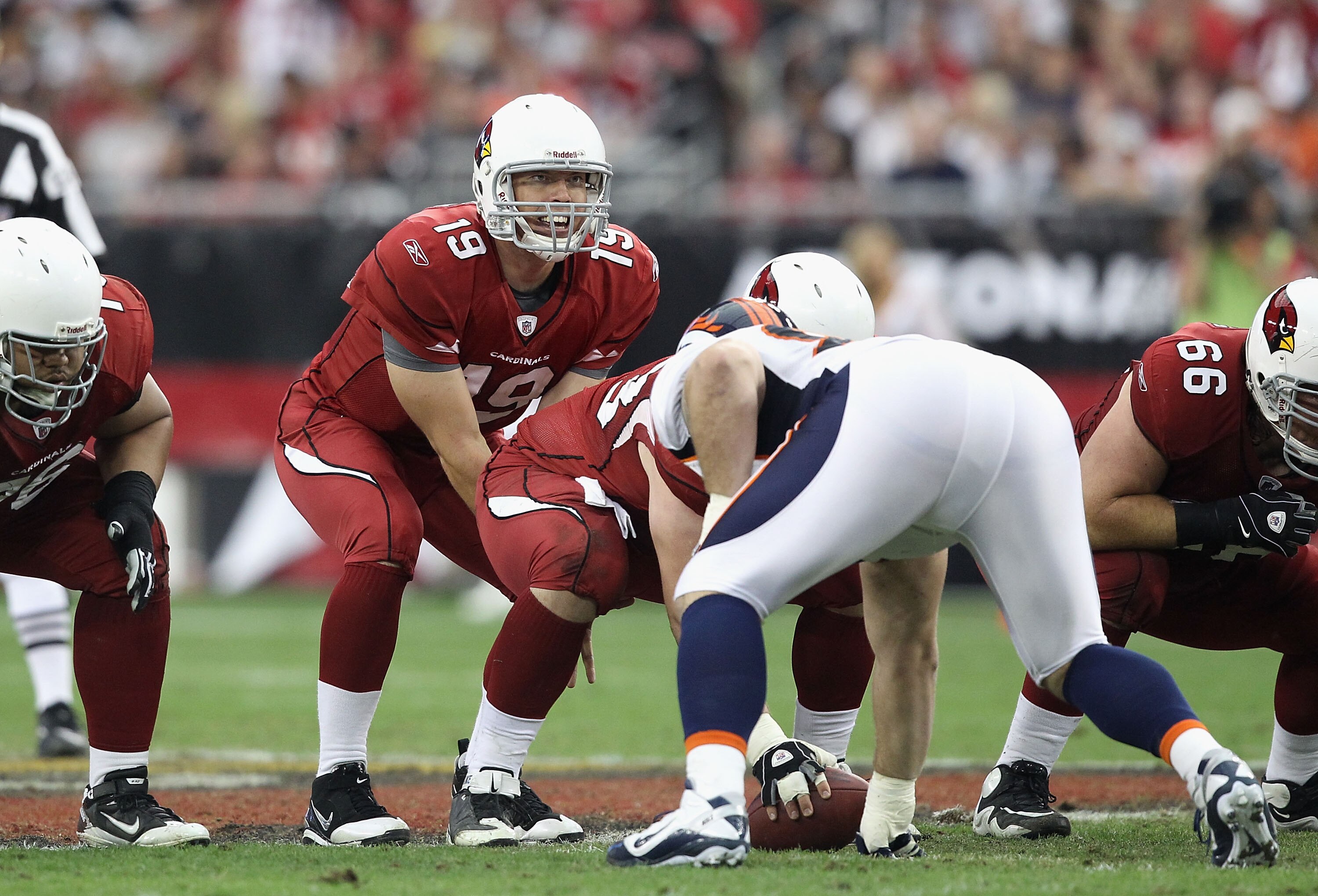 GLENDALE, AZ - DECEMBER 12:  Quarterback John Skelton #19 of the Arizona Cardinals prepares to snap the footballl during the NFL game against the Denver Broncos at the University of Phoenix Stadium on December 12, 2010 in Glendale, Arizona. The Cardinals