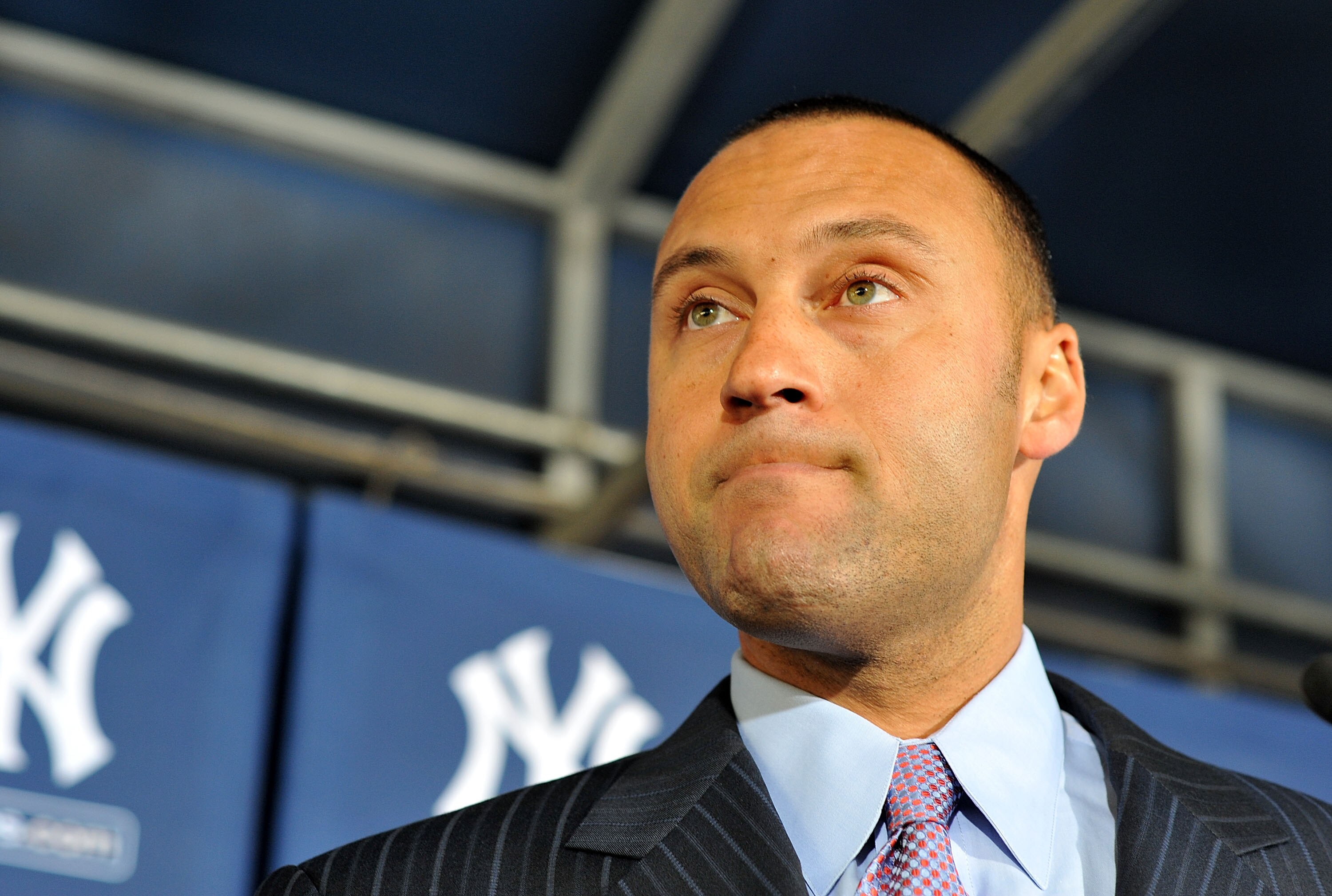 TAMPA, FL - DECEMBER 07:   Shortstop Derek Jeter of the New York Yankees talks to the media during a press conference to announce his new contract with the club on December 7, 2010 in Tampa, Florida.  (Photo by Tim Boyles/Getty Images)