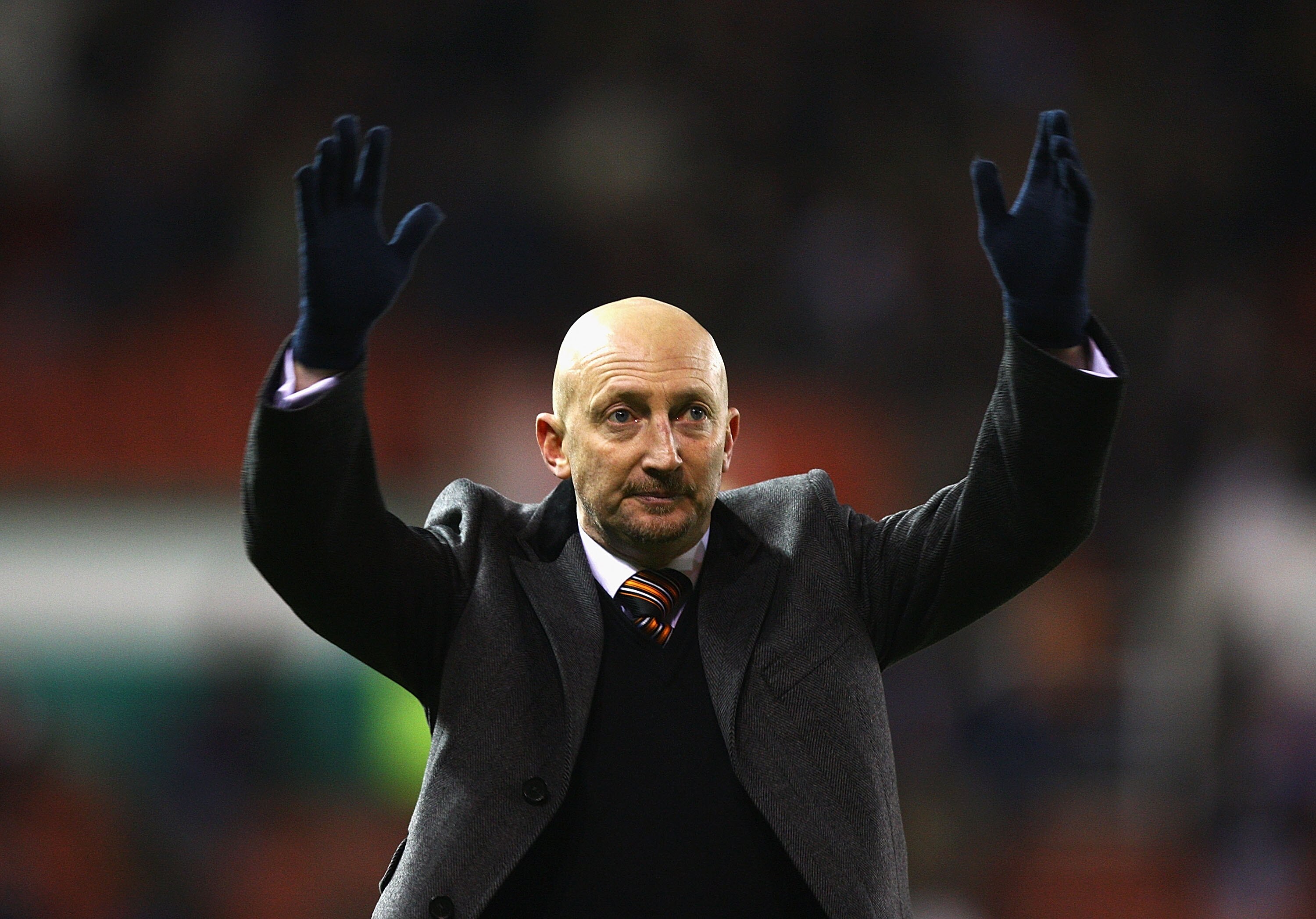 STOKE ON TRENT, ENGLAND - DECEMBER 11:  Ian Holloway, manager of Blackpool thanks the supporters during the Barclays Premier League match between Stoke City and Blackpool at Britannia Stadium on December 11, 2010 in Stoke on Trent, England.  (Photo by Mat