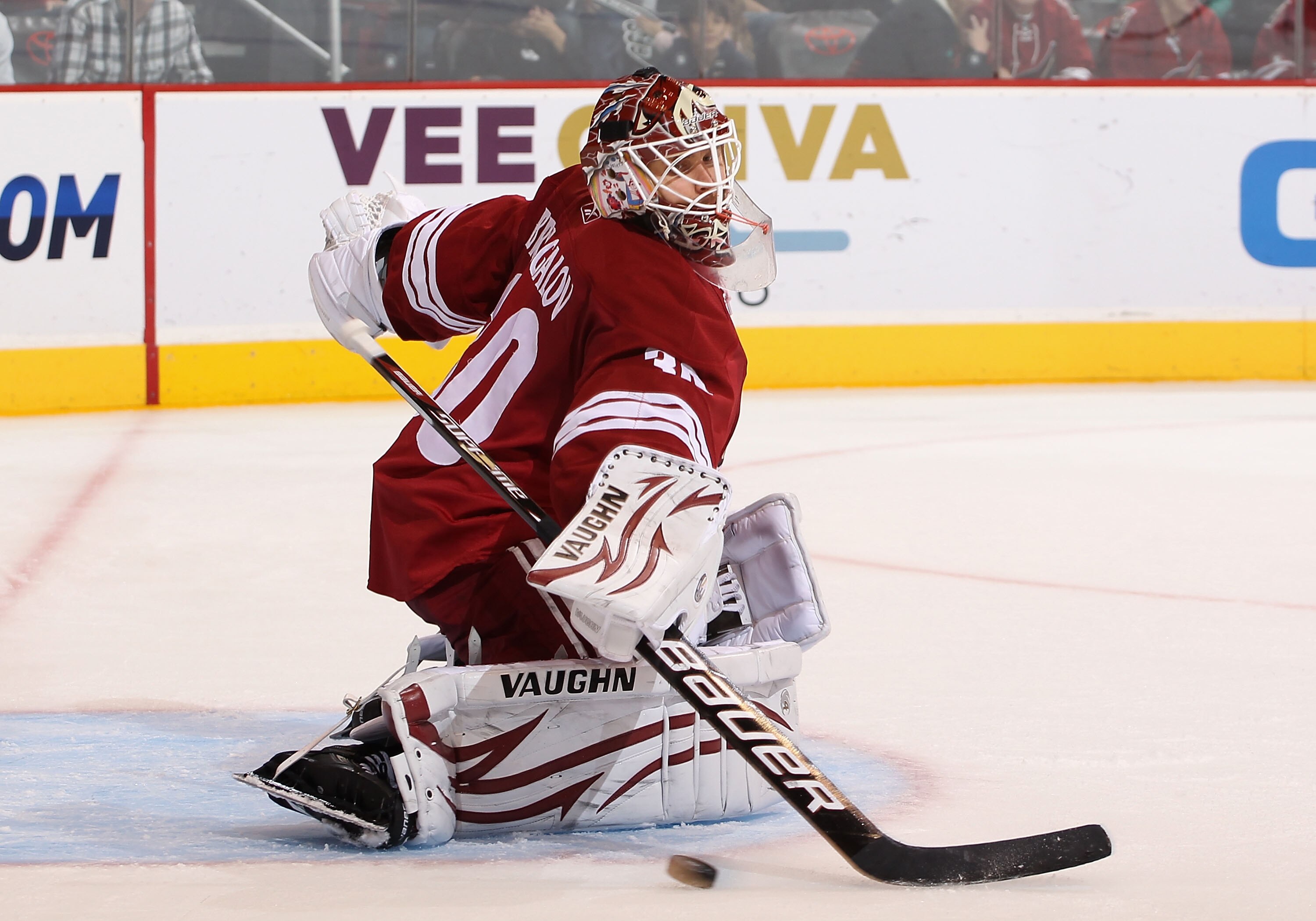 GLENDALE, AZ - DECEMBER 11:  Goaltender Ilya Bryzgalov #30 of the Phoenix Coyotes makes a pad save on the shot from the Dallas Stars during the NHL game at Jobing.com Arena on December 11, 2010 in Glendale, Arizona. The Coyotes defeated the Stars 5-2.  (P