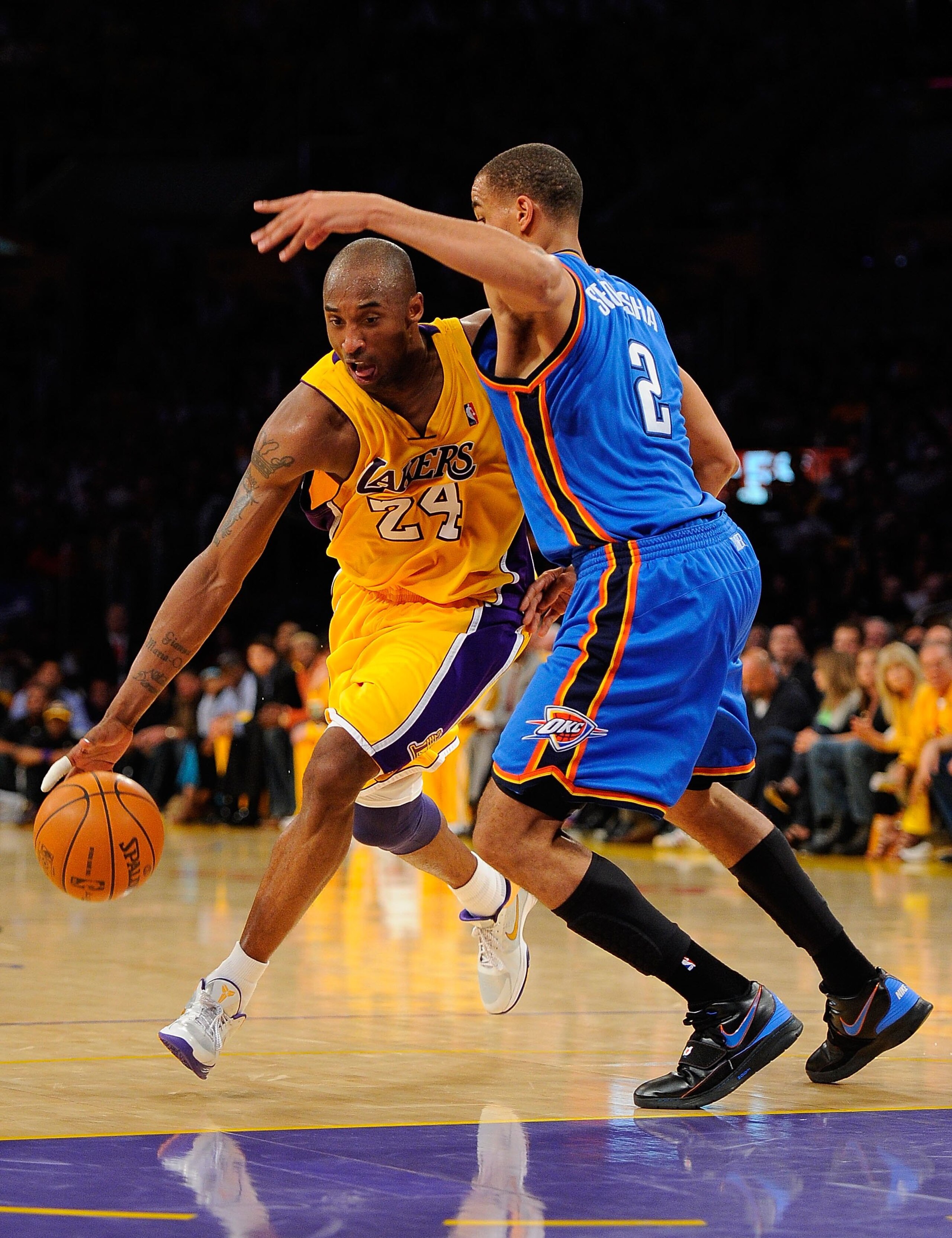 LOS ANGELES, CA - APRIL 27: Kobe Bryant #24 of the Los Angeles Lakers drives on Thabo Sefolosha #2 of the Oklahoma City Thunder during Game Five of the Western Conference Quarterfinals of the 2010 NBA Playoffs at Staples Center on April 27, 2010 in Los A LOS ANGELES, CA - APRIL 27: Kobe Bryant #24 of the Los Angeles Lakers drives on Thabo Sefolosha #2 of the Oklahoma City Thunder during Game Five of the Western Conference Quarterfinals of the 2010 NBA Playoffs at Staples Center on April 27, 2010 in Los A