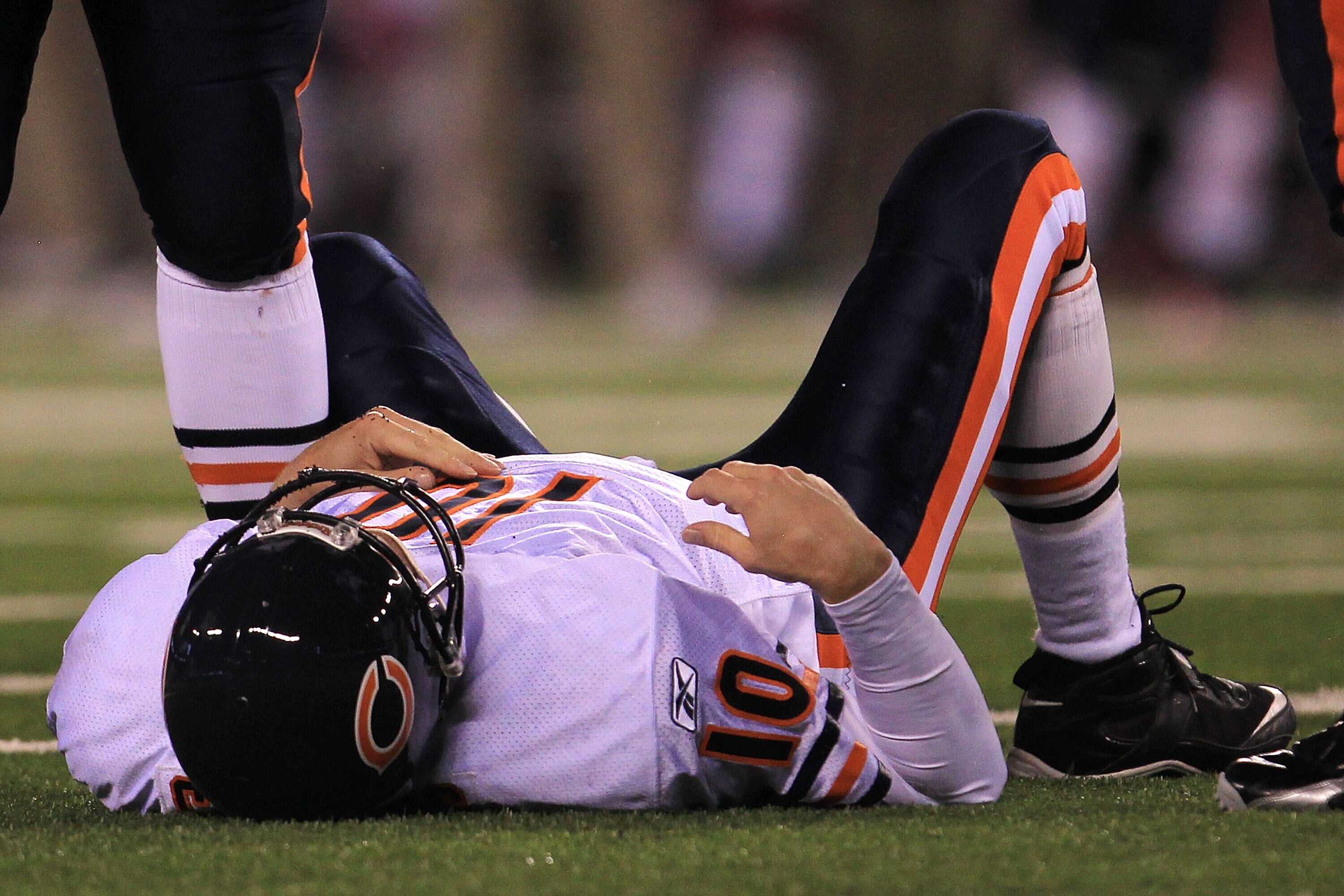 EAST RUTHERFORD, NJ - OCTOBER 03:  Todd Collins #10 of the Chicago Bears lays on the field after getting injured against the New York Giants at New Meadowlands Stadium on October 3, 2010 in East Rutherford, New Jersey.  (Photo by Chris McGrath/Getty Image
